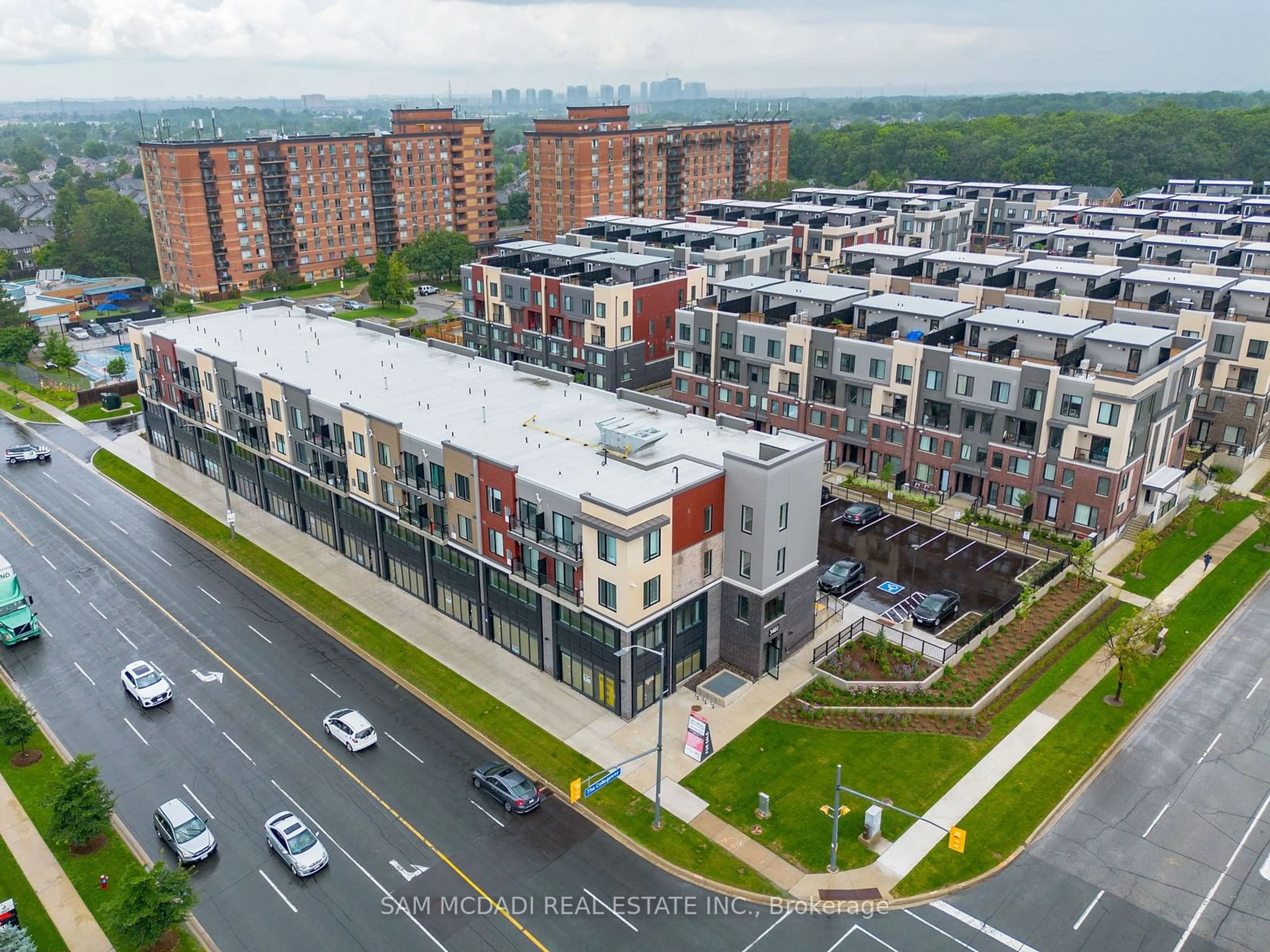 A pic from exterior of the house or condo, the view of city buildings for 3401 Ridgeway Dr #416, Mississauga Ontario L5L 5T3