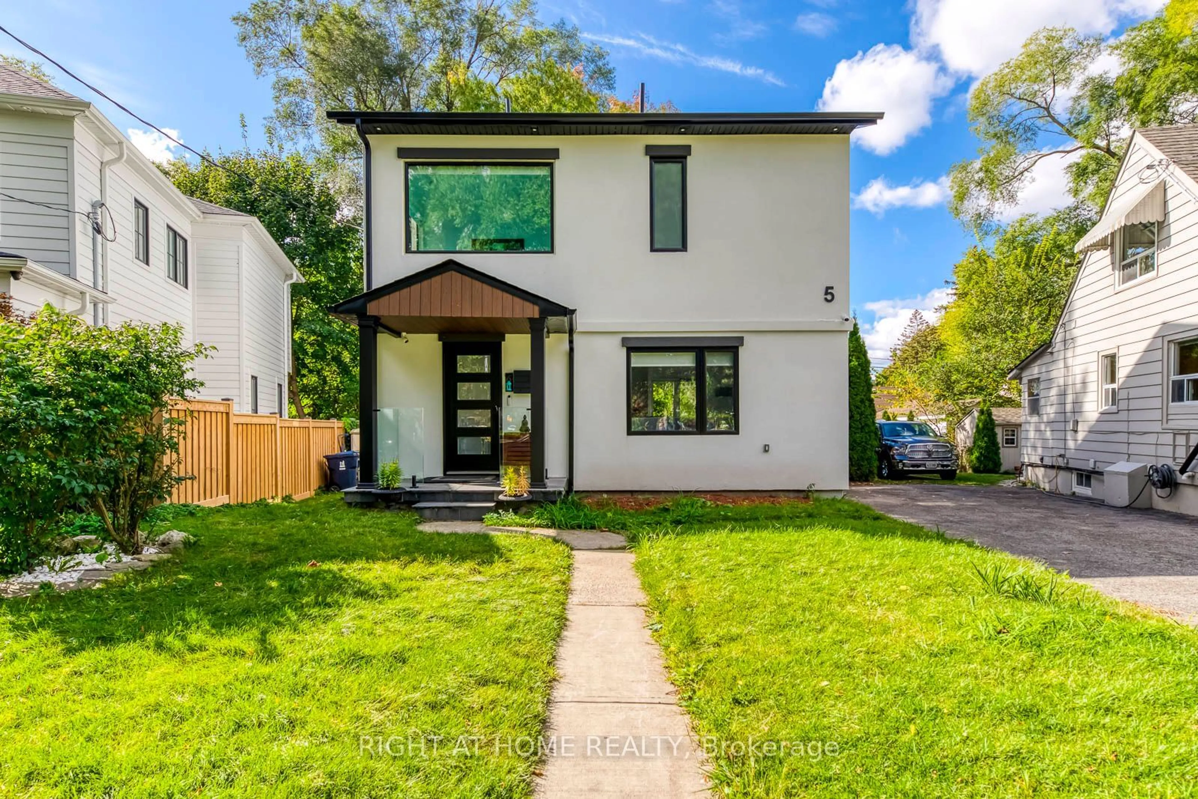 Frontside or backside of a home, cottage for 5 Saunders Cres, Toronto Ontario M8Y 2P7