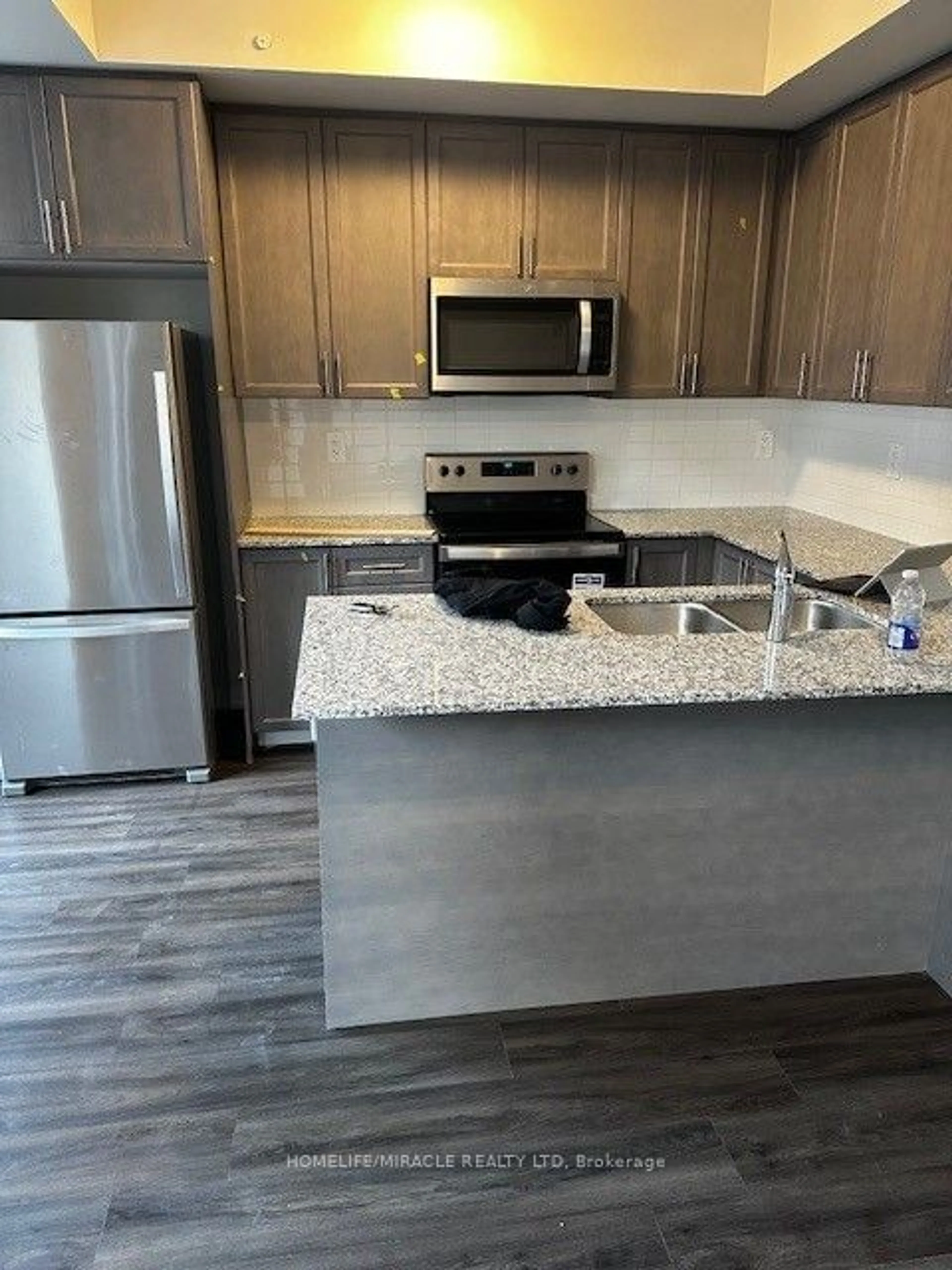 Standard kitchen, wood floors for 1569 Rose Way #105, Milton Ontario L9T 7E7