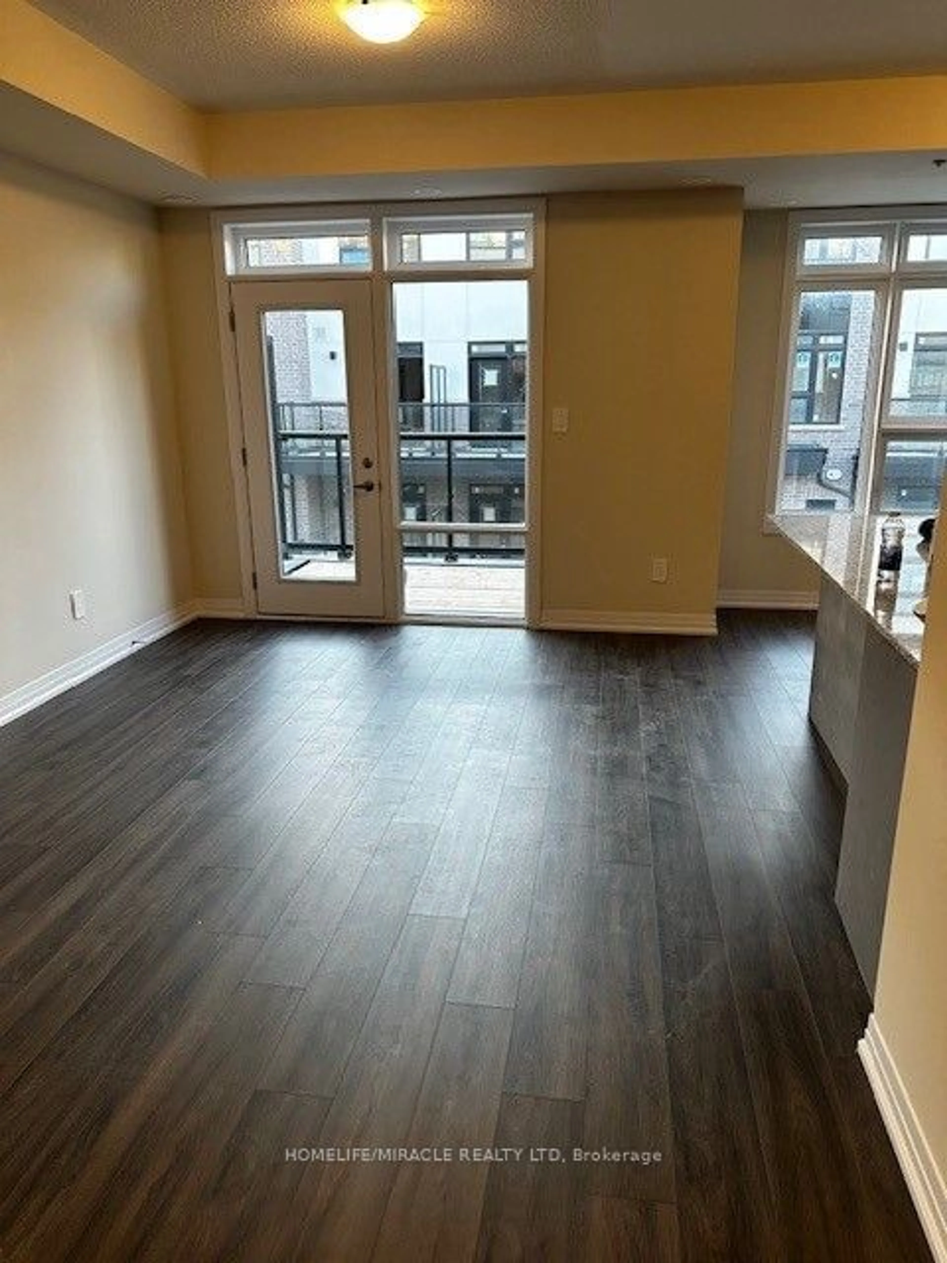 A pic of a room, wood floors for 1569 Rose Way #105, Milton Ontario L9T 7E7