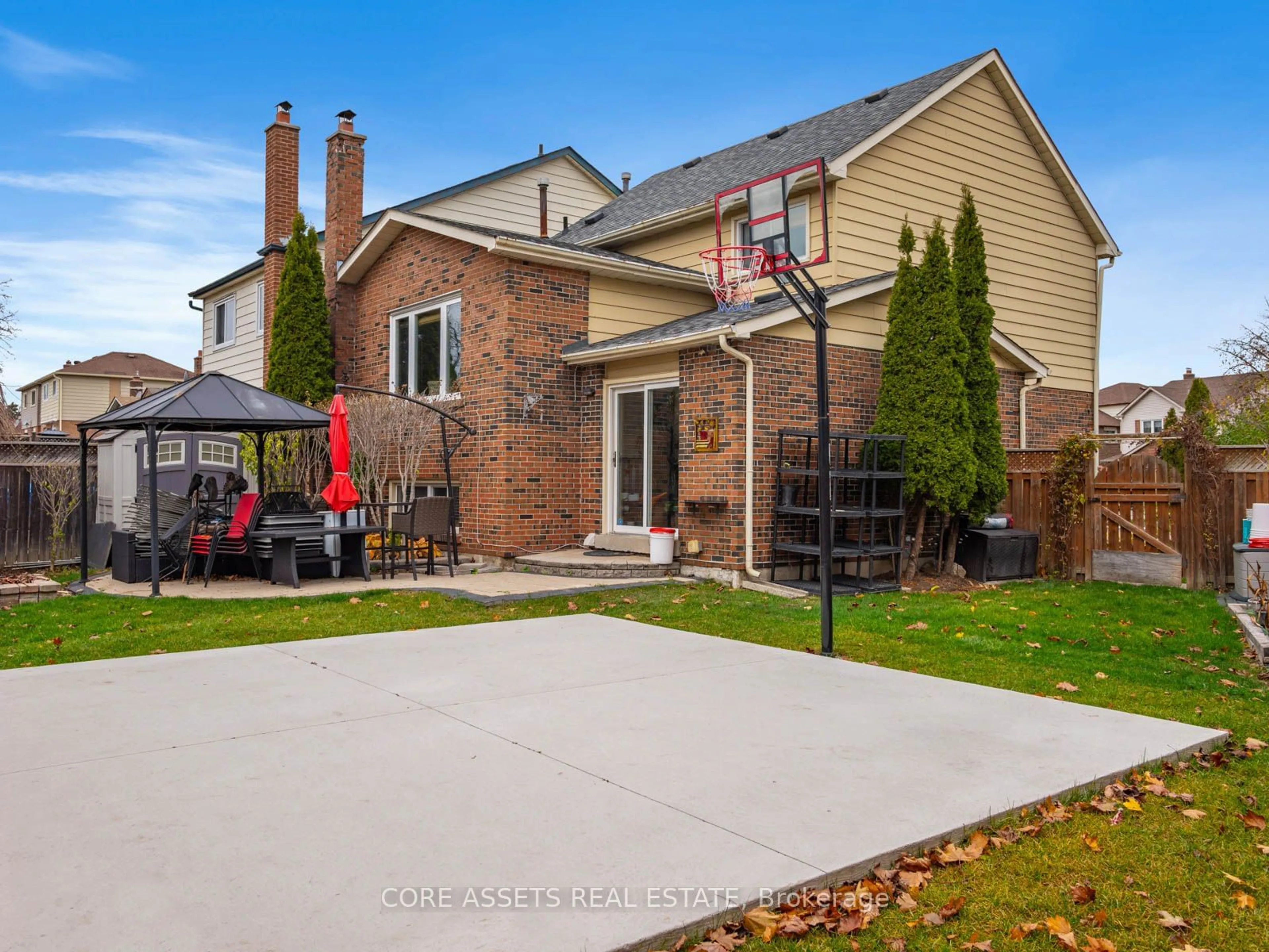 Frontside or backside of a home, the fenced backyard for 22 Bryant Crt, Brampton Ontario L6X 2T1