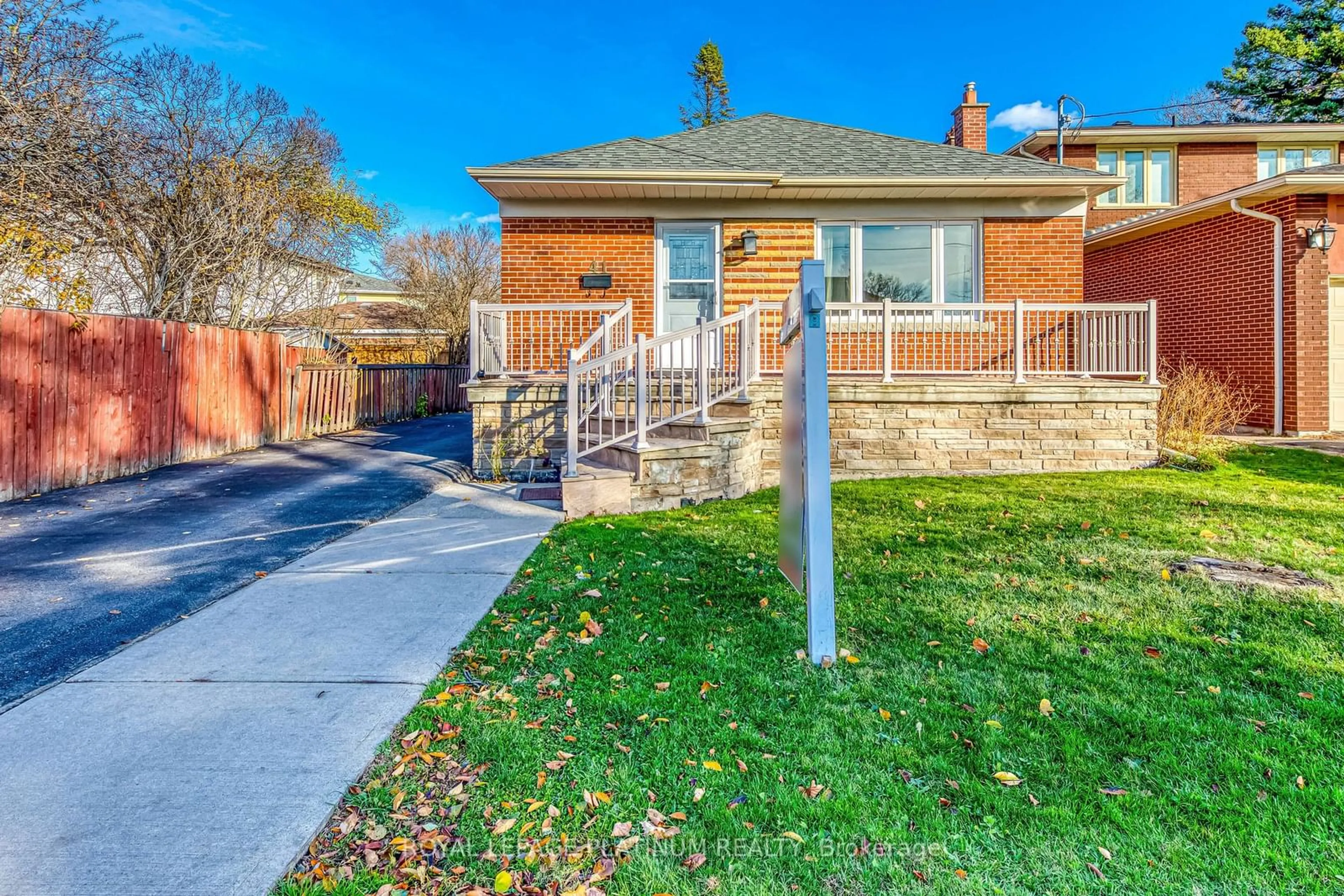 A pic from exterior of the house or condo, the fenced backyard for 41 Edilou Dr, Toronto Ontario M8W 4B4