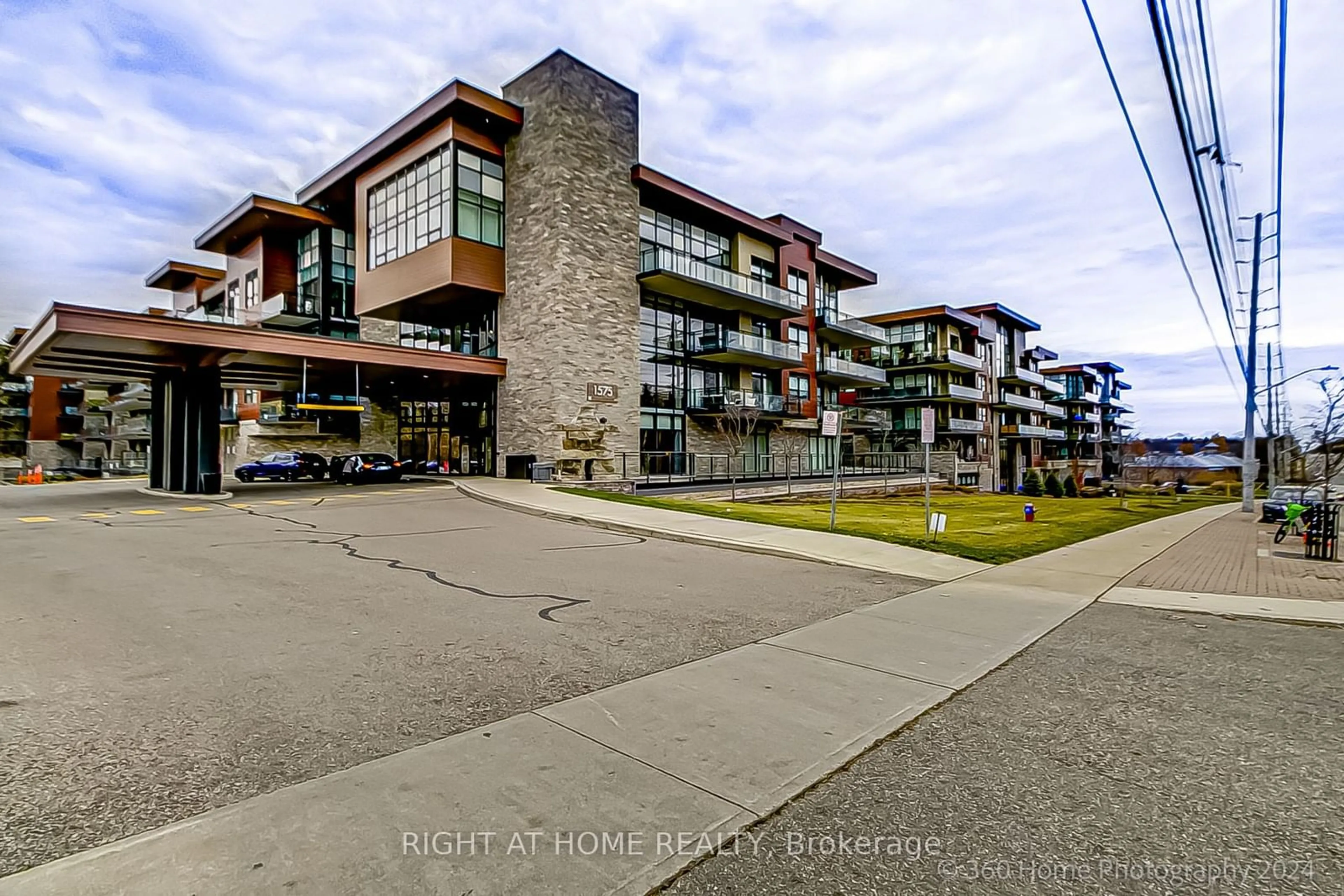 A pic from exterior of the house or condo, the street view for 1575 Lakeshore Rd #227, Mississauga Ontario L5J 0B1