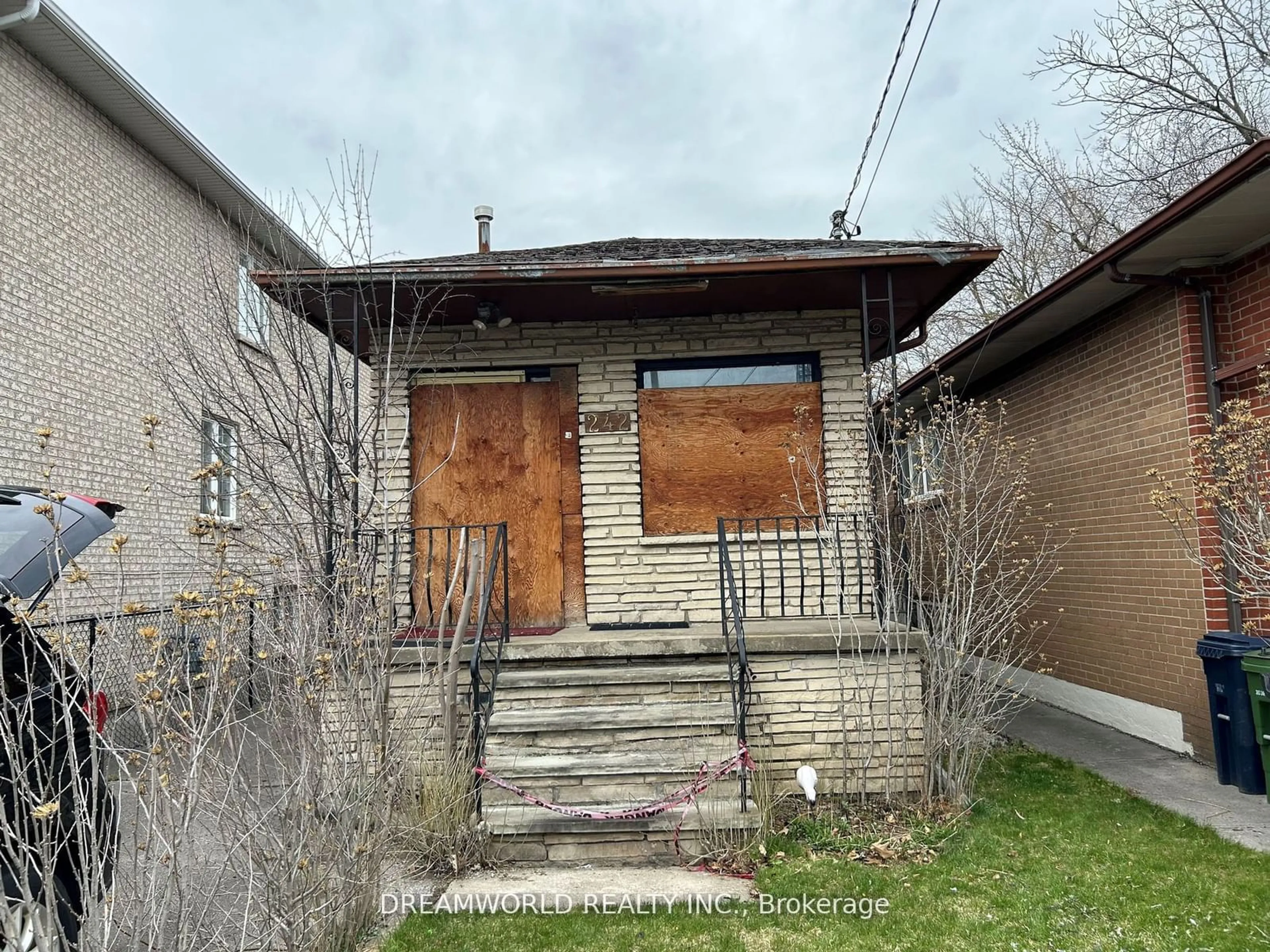 Frontside or backside of a home, the front or back of building for 242 Glen Park Ave, Toronto Ontario M6B 2E3