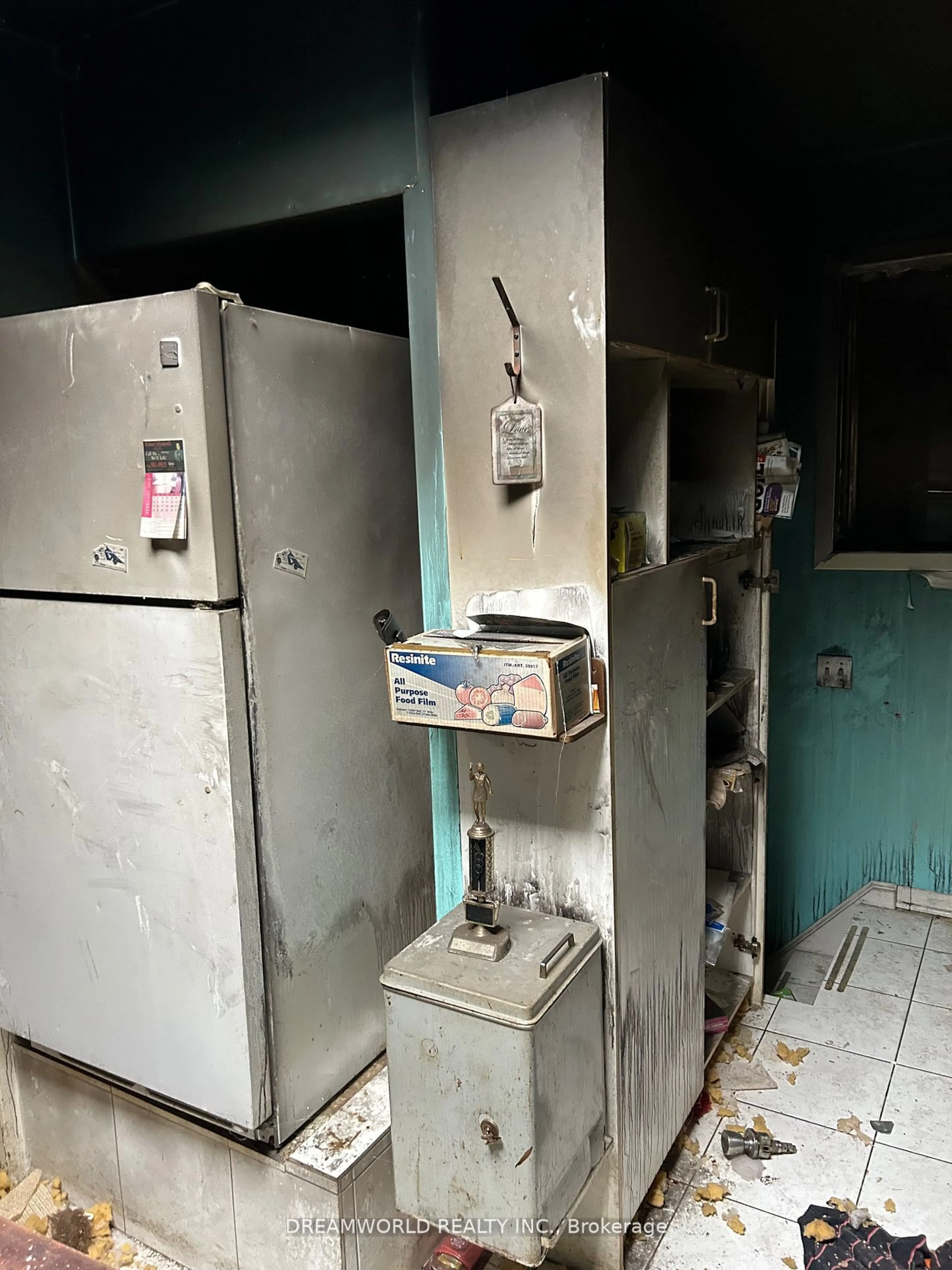 Kitchen with laundary machines, unknown floor for 242 Glen Park Ave, Toronto Ontario M6B 2E3