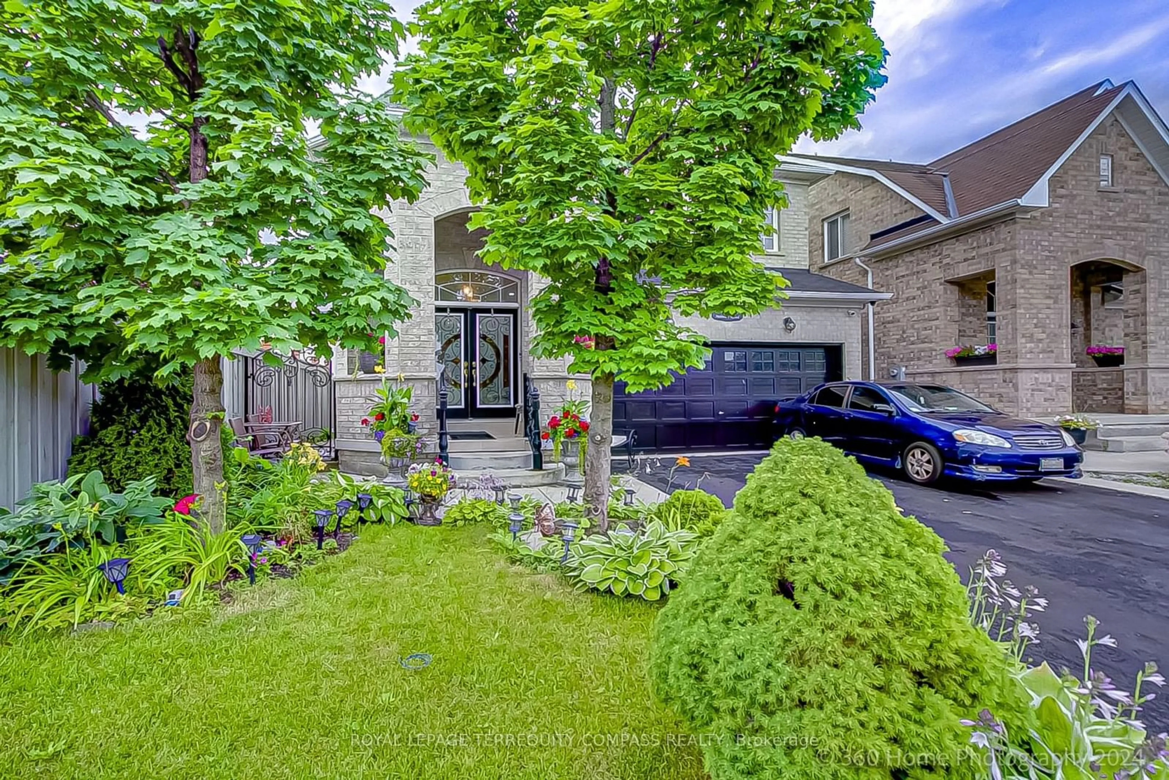 A pic from exterior of the house or condo, the street view for 12 Helman Rd, Brampton Ontario L6R 0R6