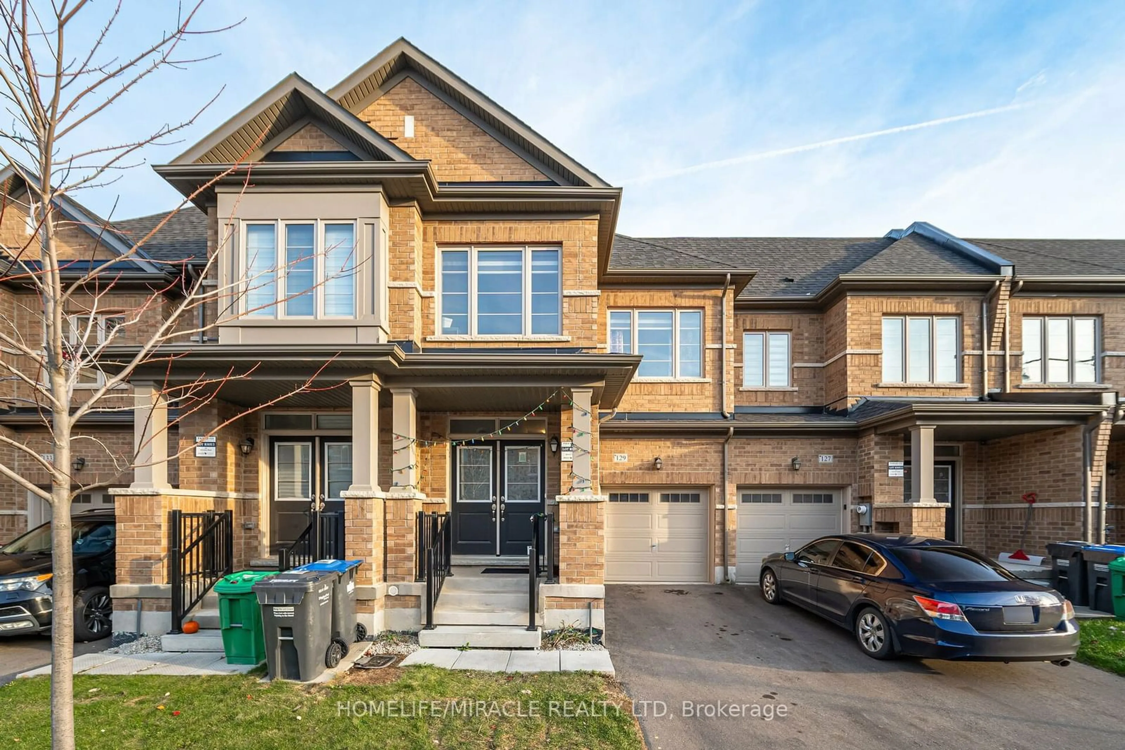 Frontside or backside of a home, the street view for 129 Adventura Rd, Brampton Ontario L7A 5A7