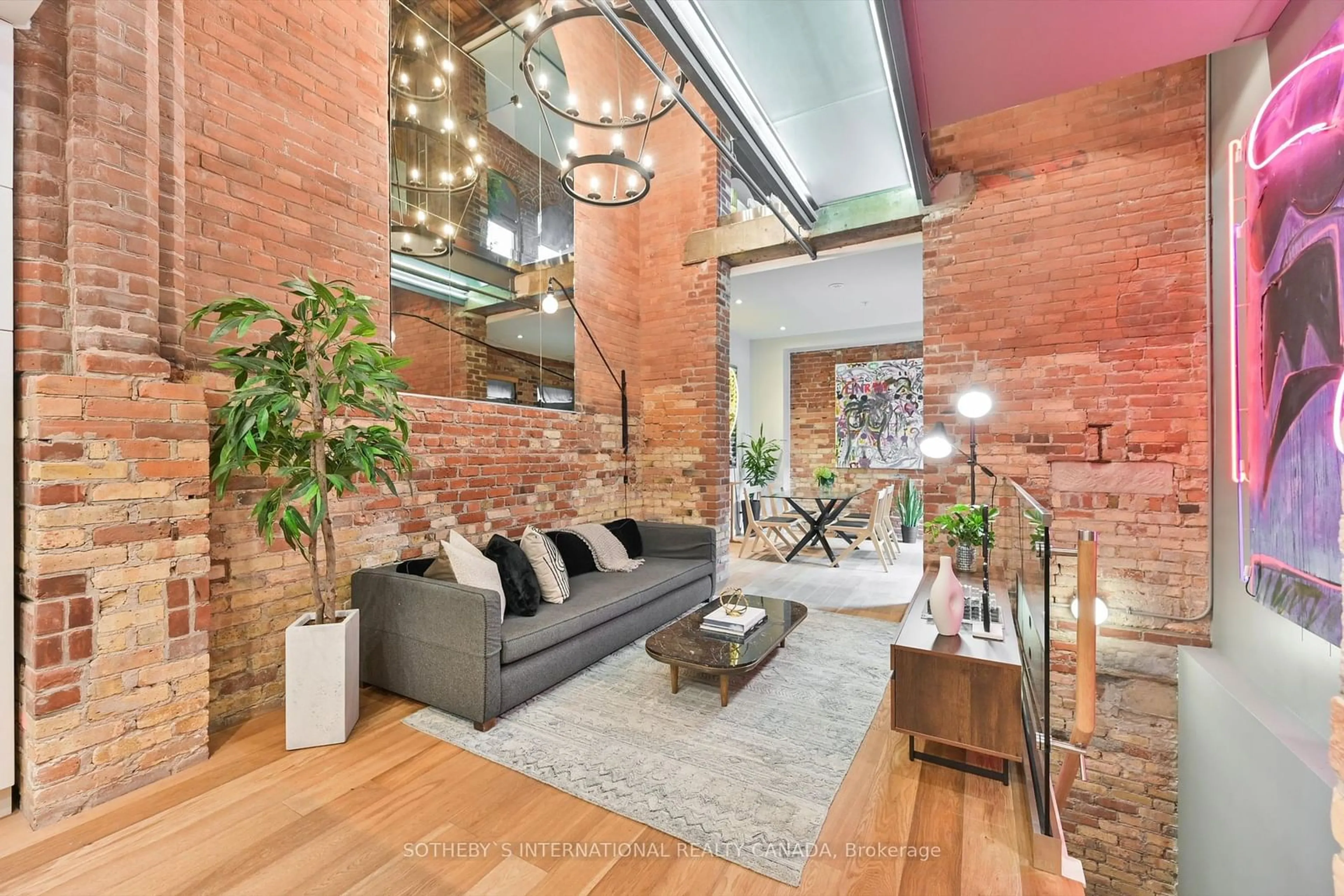 Living room, wood floors for 40 Westmoreland Ave #TH7, Toronto Ontario M6H 2Z7