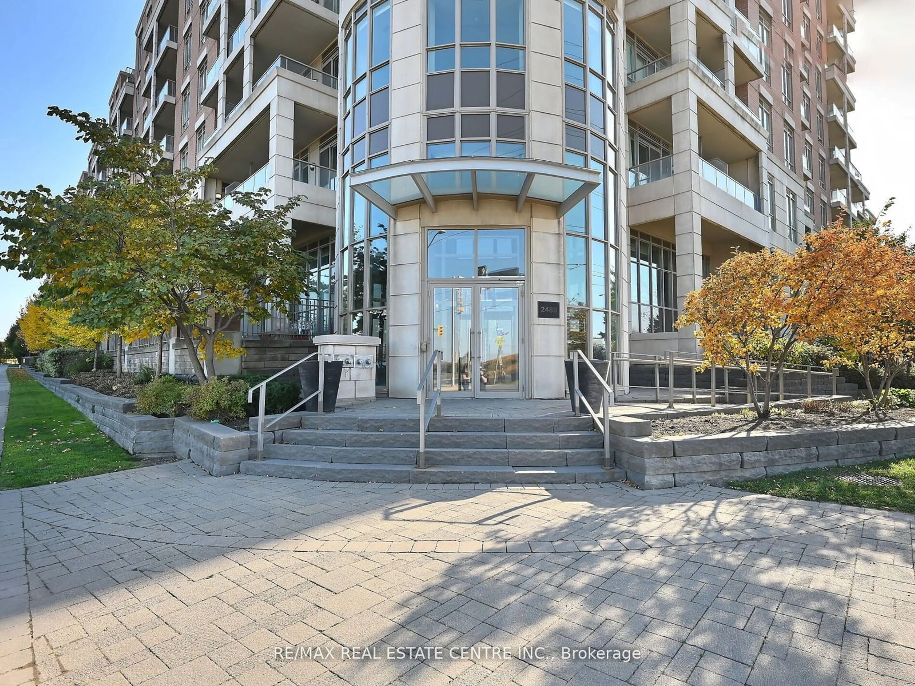 A pic from exterior of the house or condo, the street view for 2480 Prince Michael Dr #107, Oakville Ontario L6H 0E9