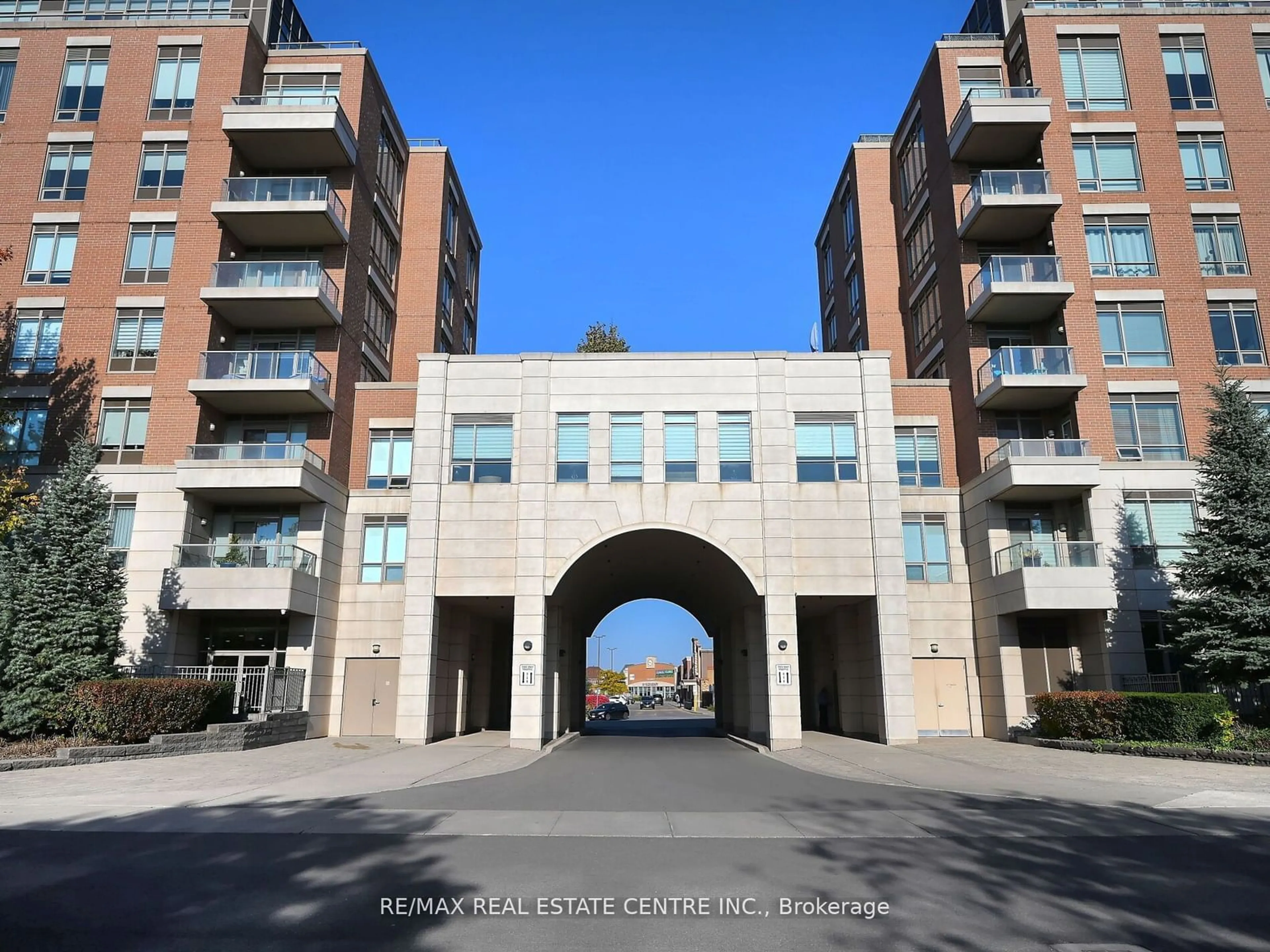 A pic from exterior of the house or condo, the street view for 2480 Prince Michael Dr #107, Oakville Ontario L6H 0E9