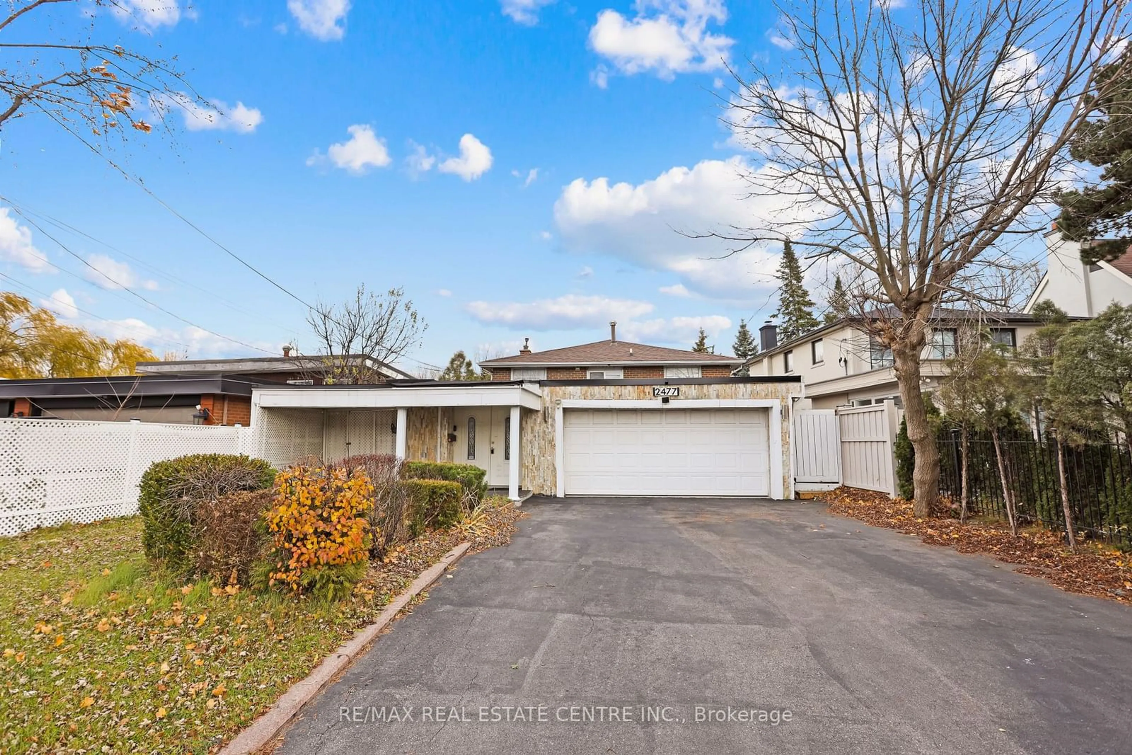 Frontside or backside of a home, the fenced backyard for 2477 Islington Ave, Toronto Ontario M9W 3X9