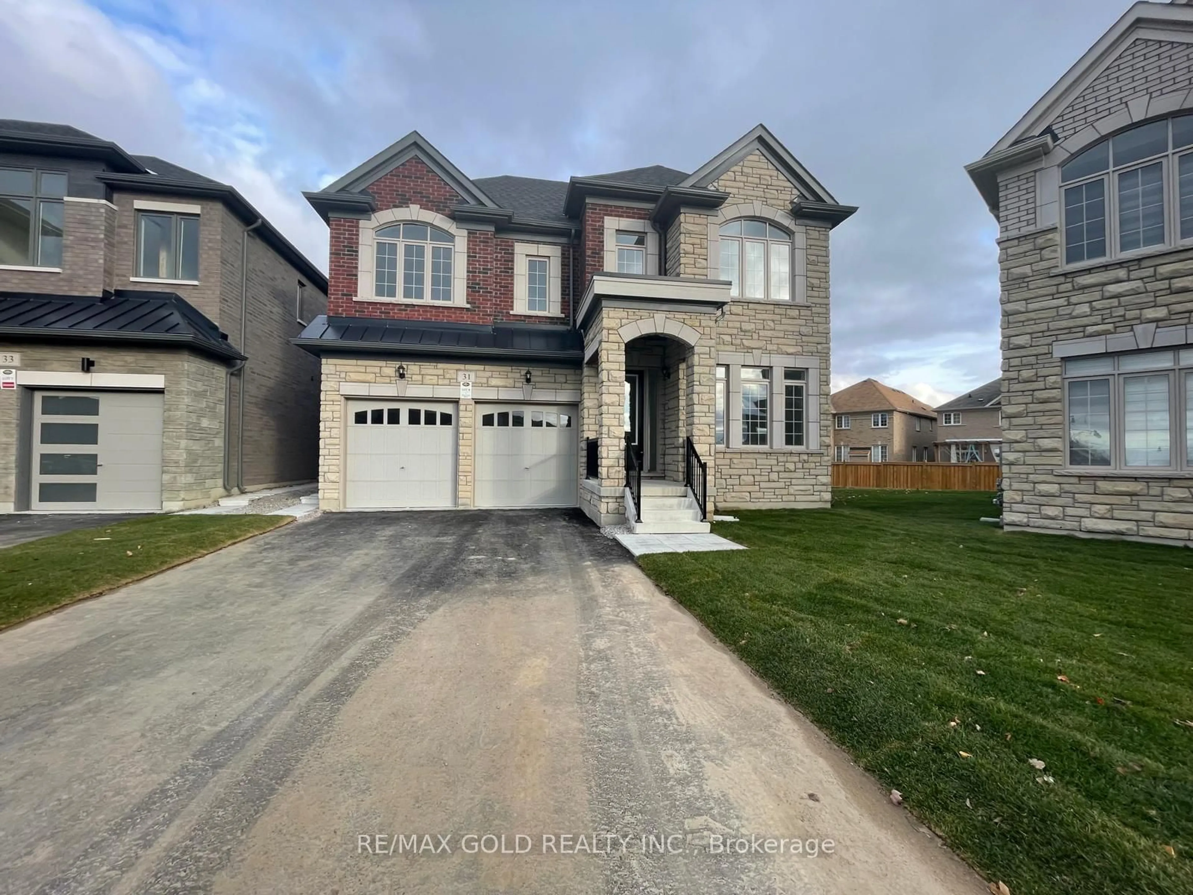 Frontside or backside of a home, the street view for 31 Dolomite Dr, Brampton Ontario L6P 4R6