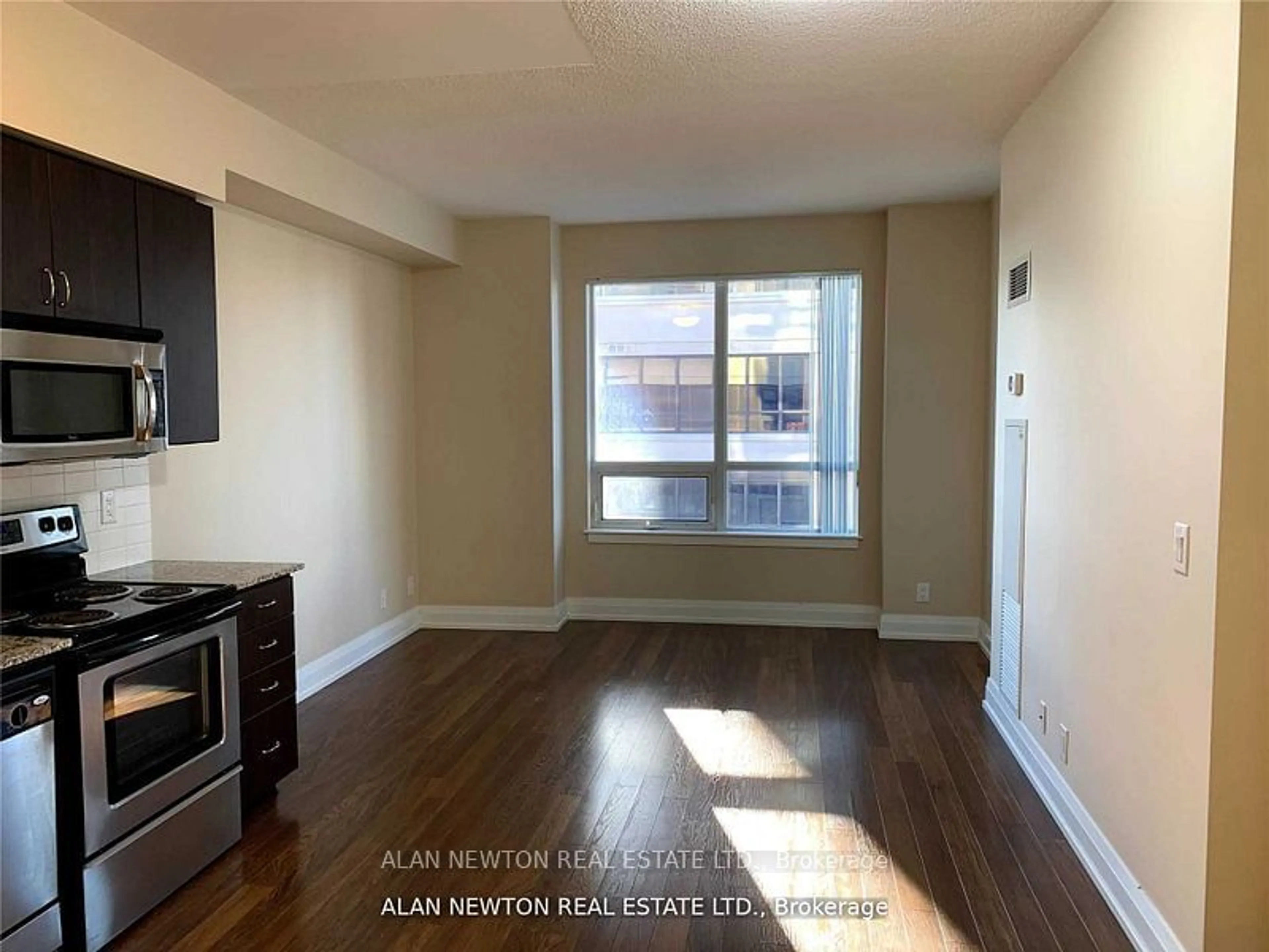 A pic of a room, wood floors for 1 De Boers Dr #314, Toronto Ontario M3J 0G6