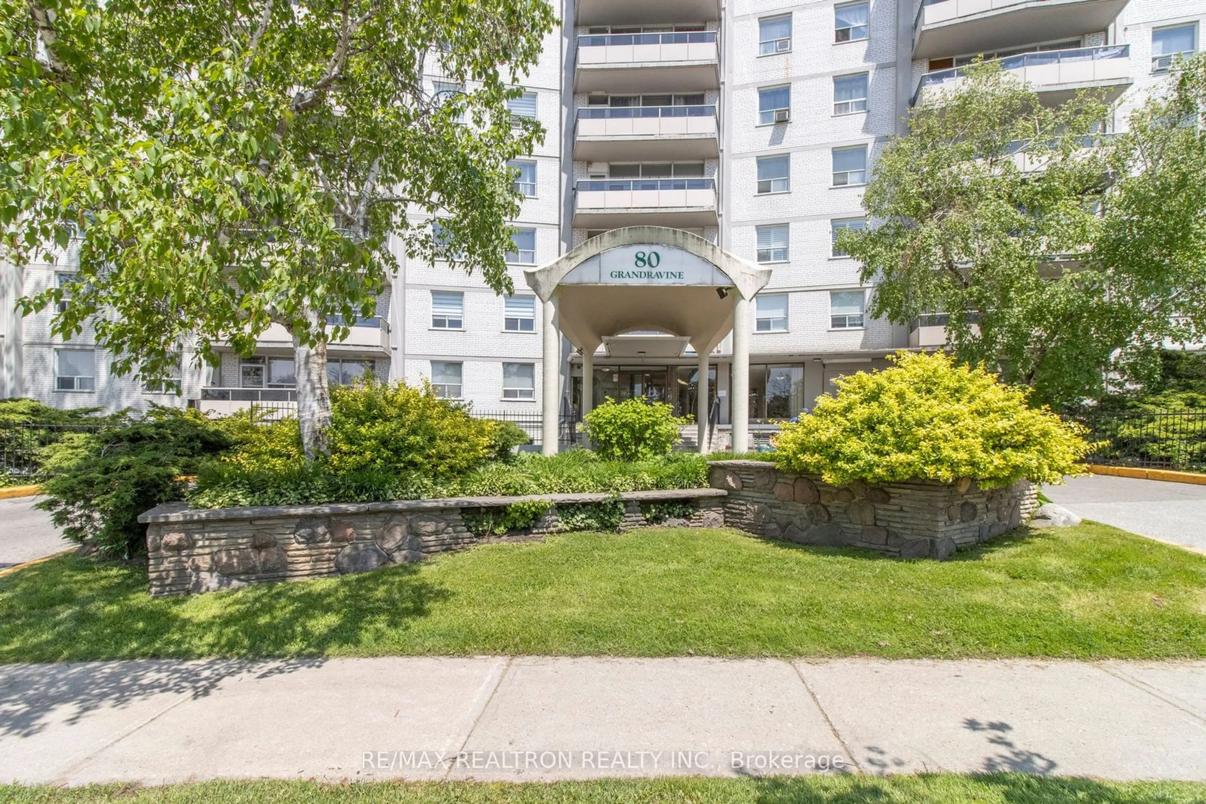 A pic from exterior of the house or condo, the street view for 80 Grandravine Dr #703, Toronto Ontario M3J 1B2