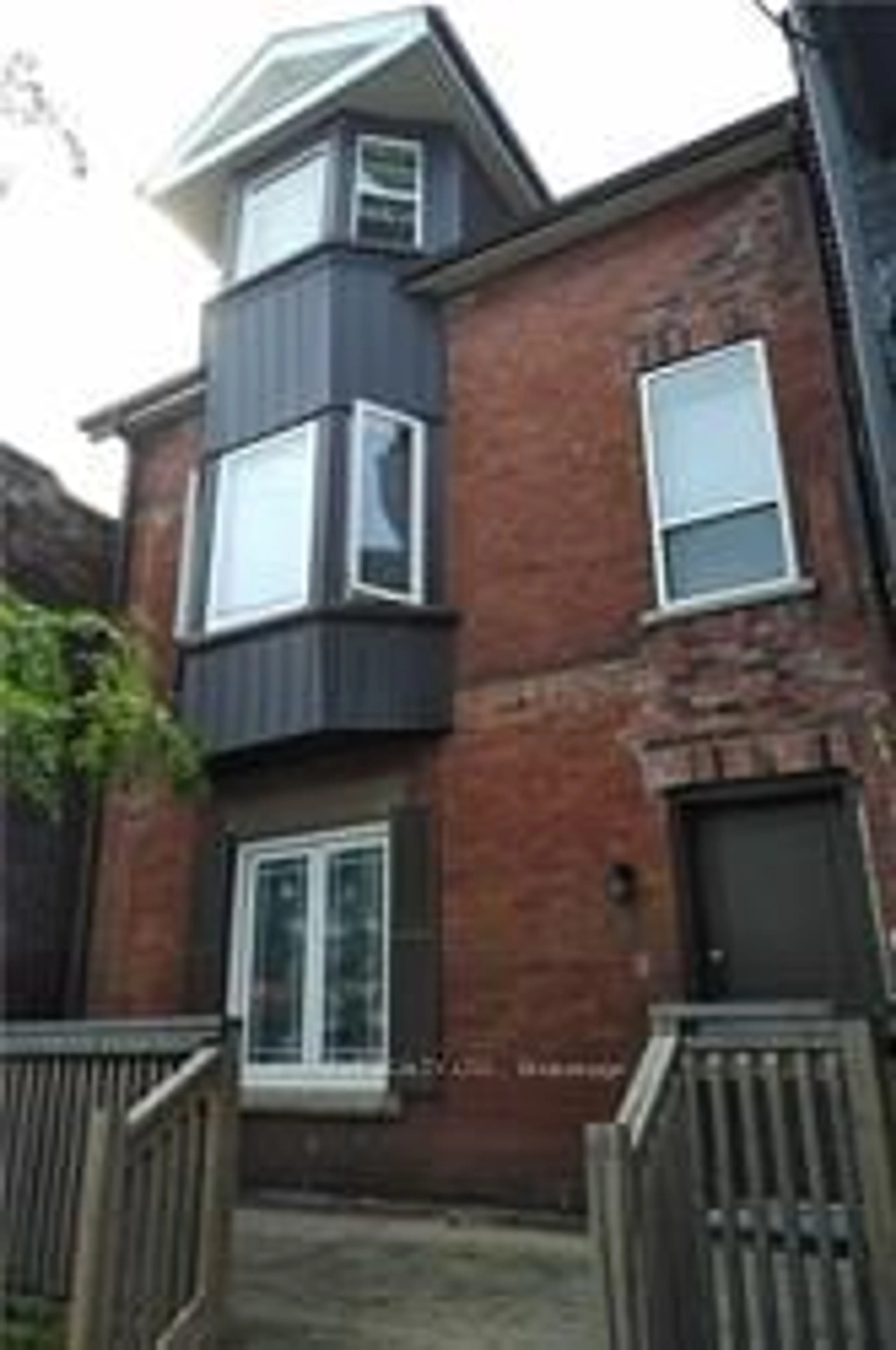 A pic from exterior of the house or condo, the front or back of building for 2011 Dundas St, Toronto Ontario M6R 1W7