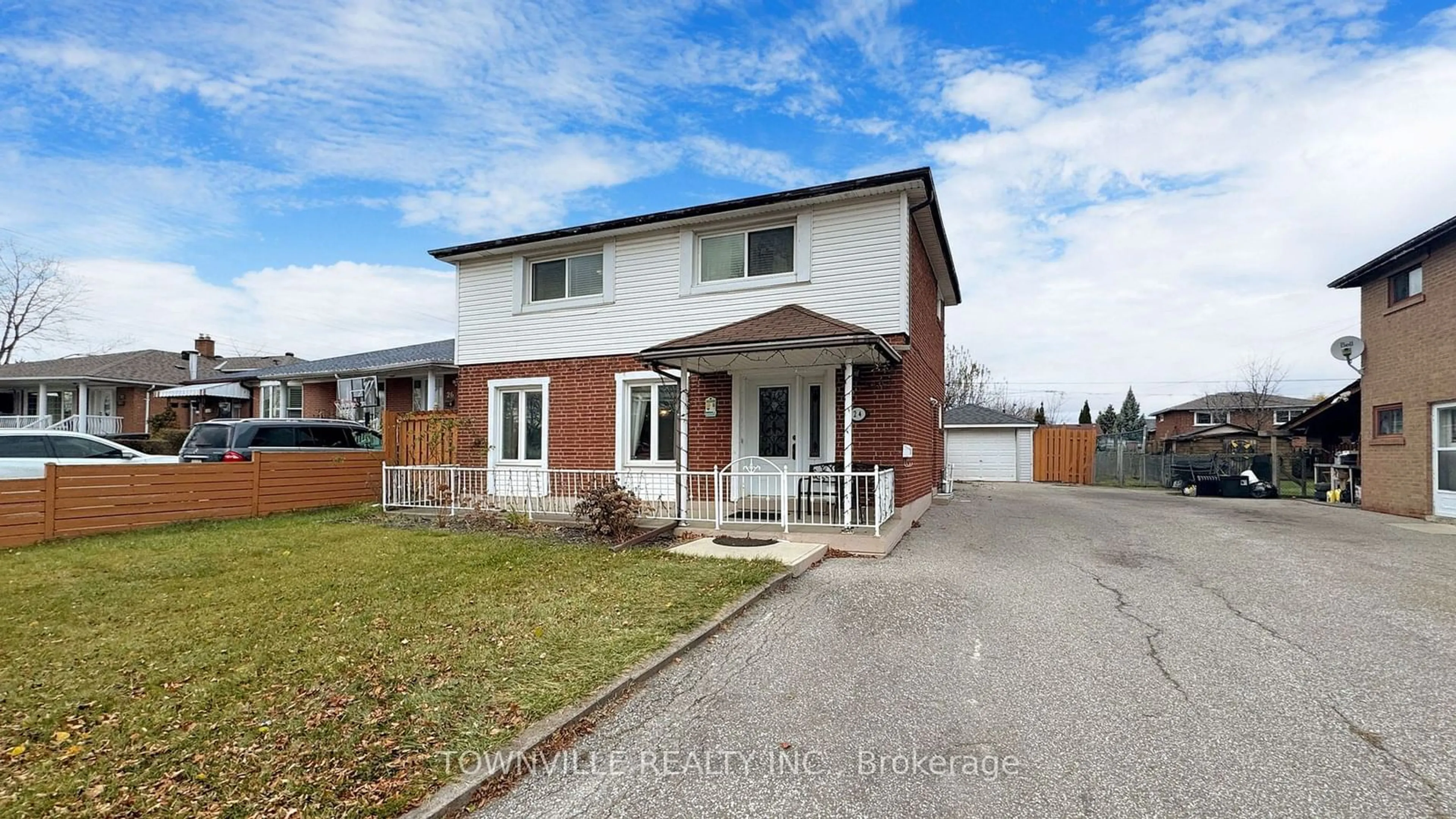 Frontside or backside of a home, the fenced backyard for 24 Avening Dr, Toronto Ontario M9V 1Y1