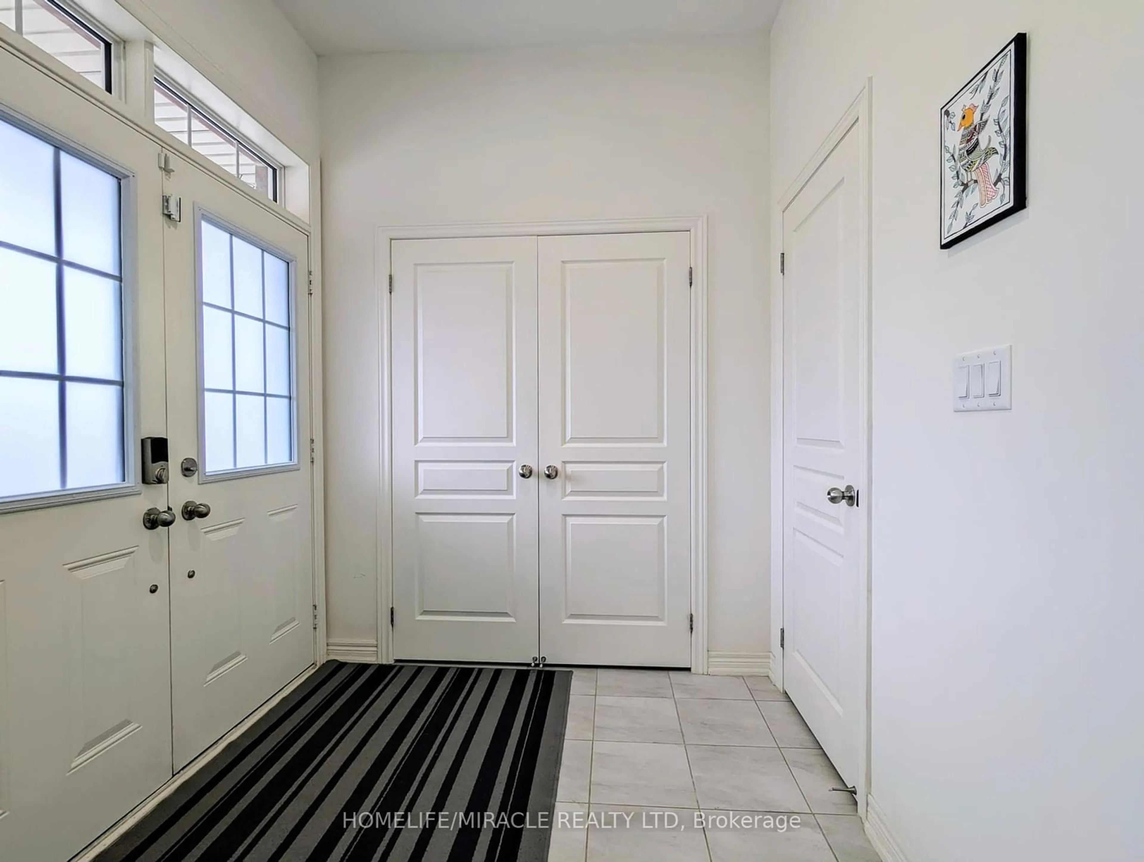 Indoor entryway, wood floors for 149 Remembrance Rd, Brampton Ontario L7A 3Y2