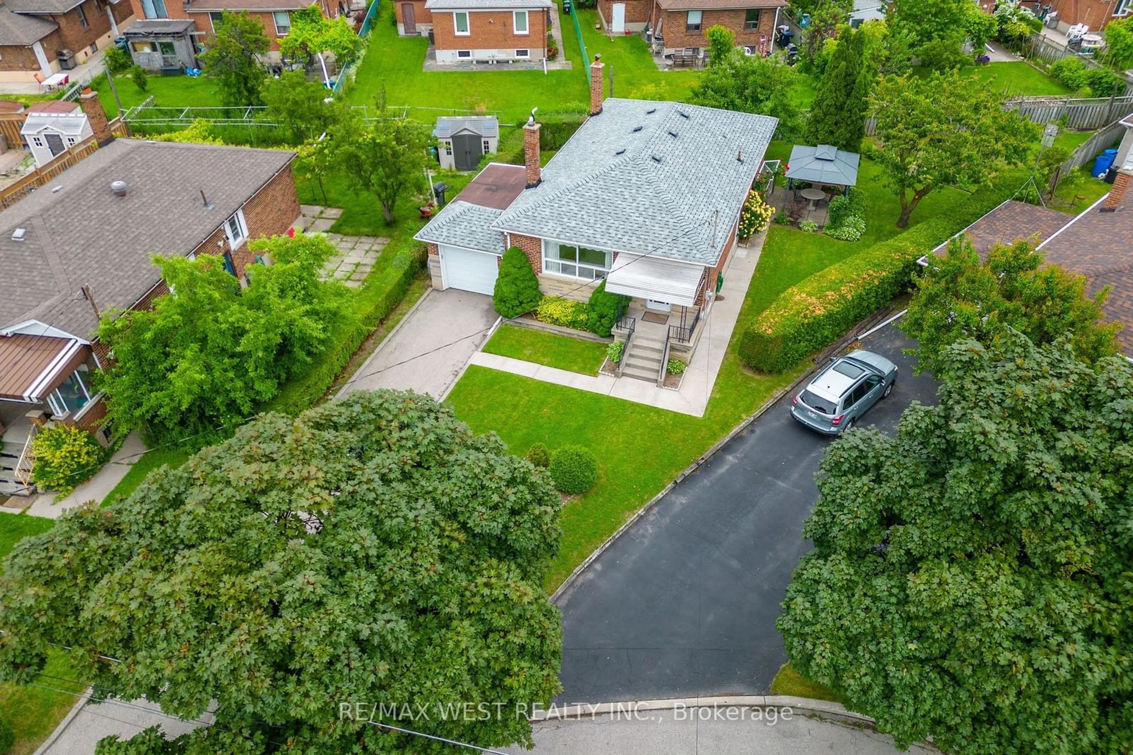 Frontside or backside of a home, the fenced backyard for 5 Picton Cres, Toronto Ontario M3K 1W4