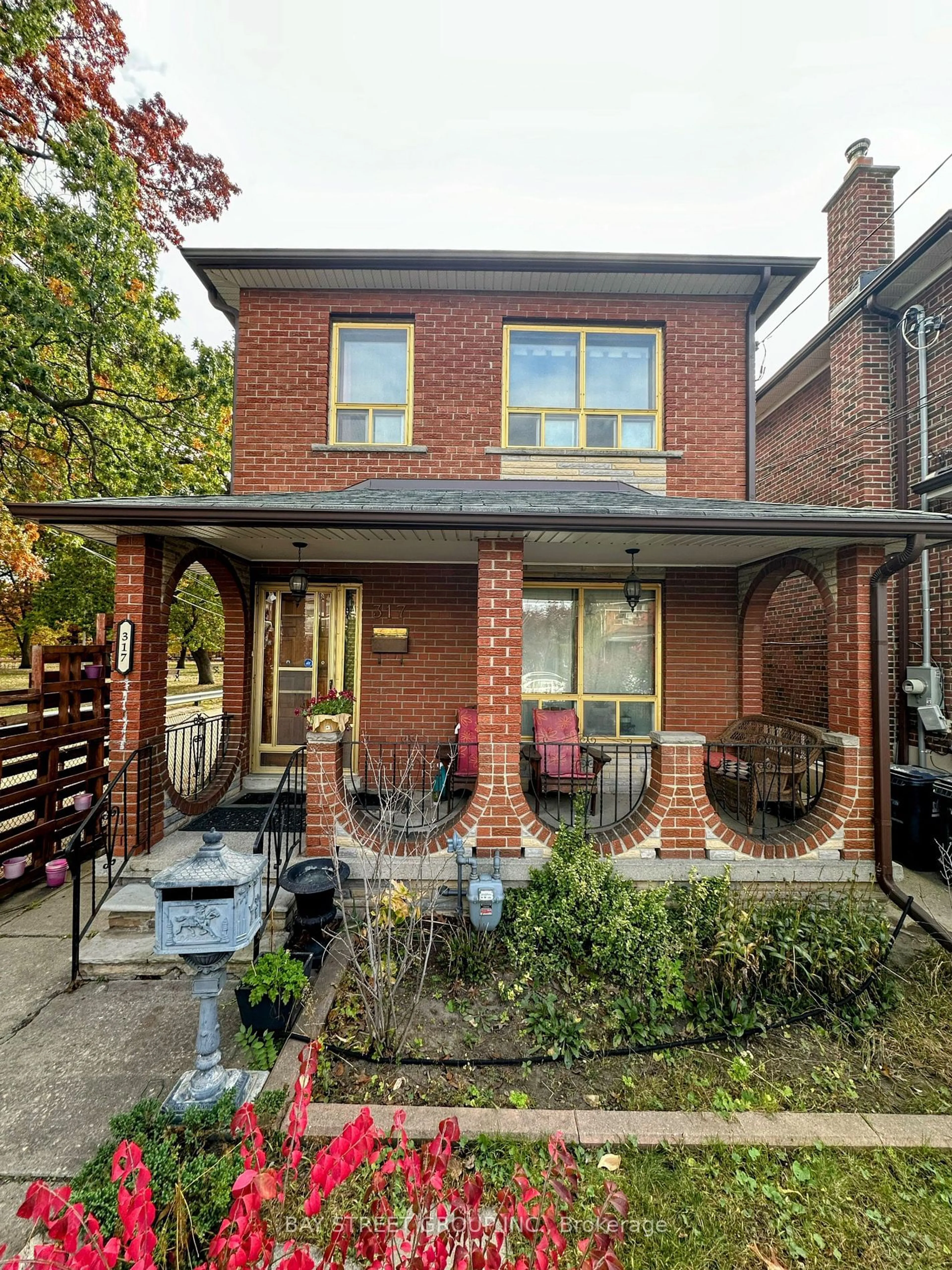 Home with brick exterior material for 317 Ryding Ave, Toronto Ontario M6N 1H6