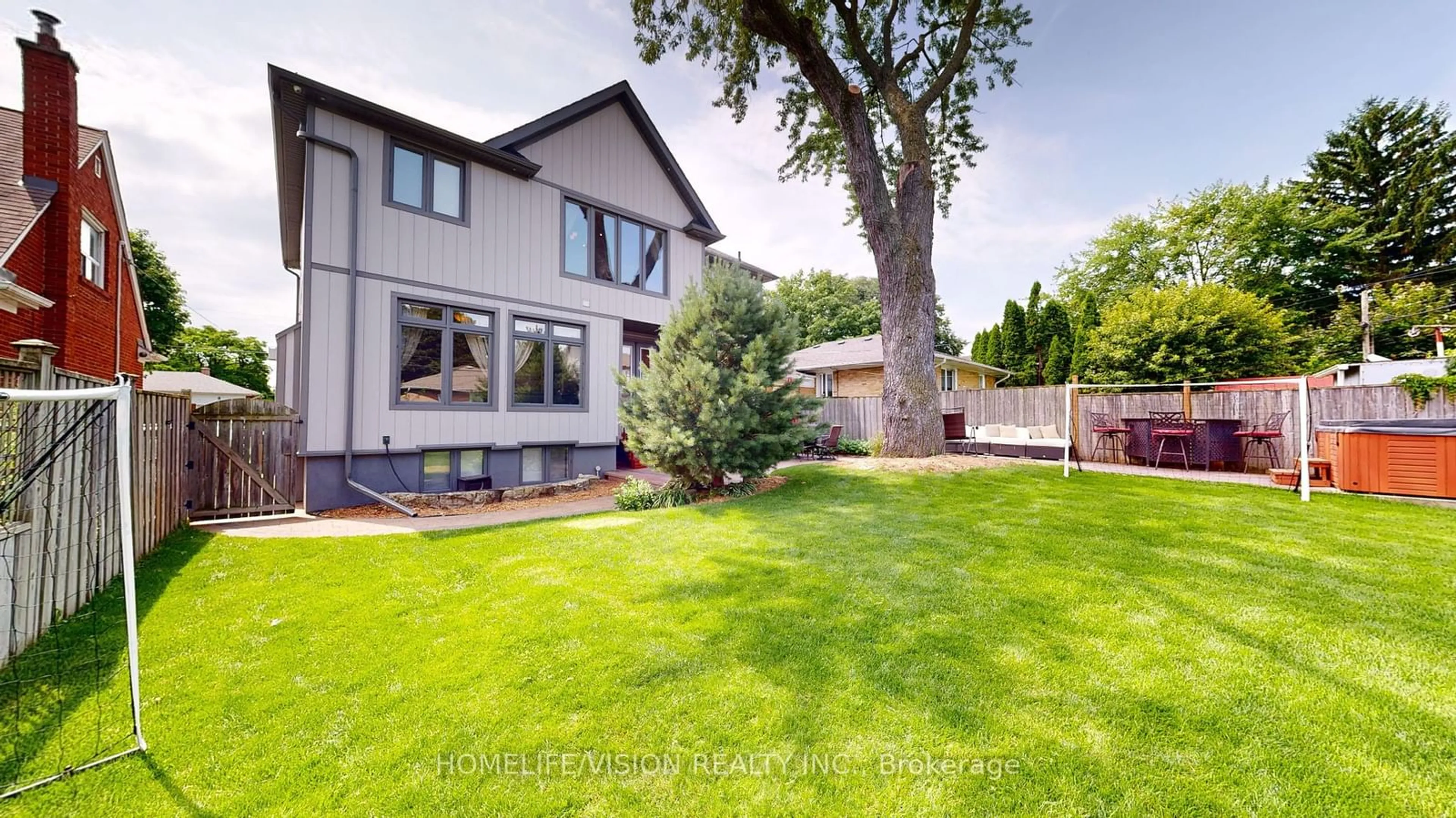 Frontside or backside of a home, the fenced backyard for 80 North Heights Rd, Toronto Ontario M9B 2T8