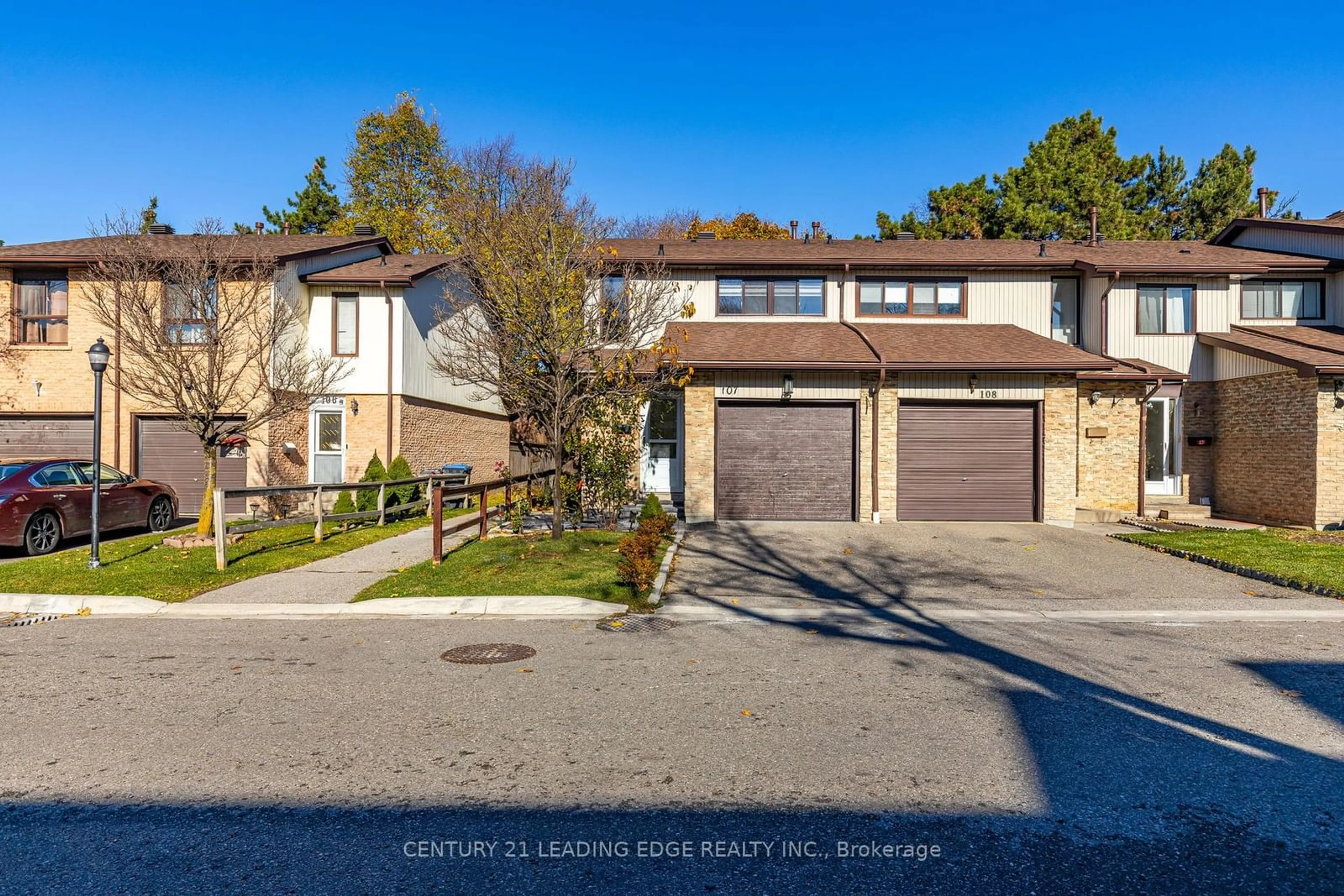 A pic from exterior of the house or condo, the street view for 107 FOSTER Cres, Brampton Ontario L6V 3M8