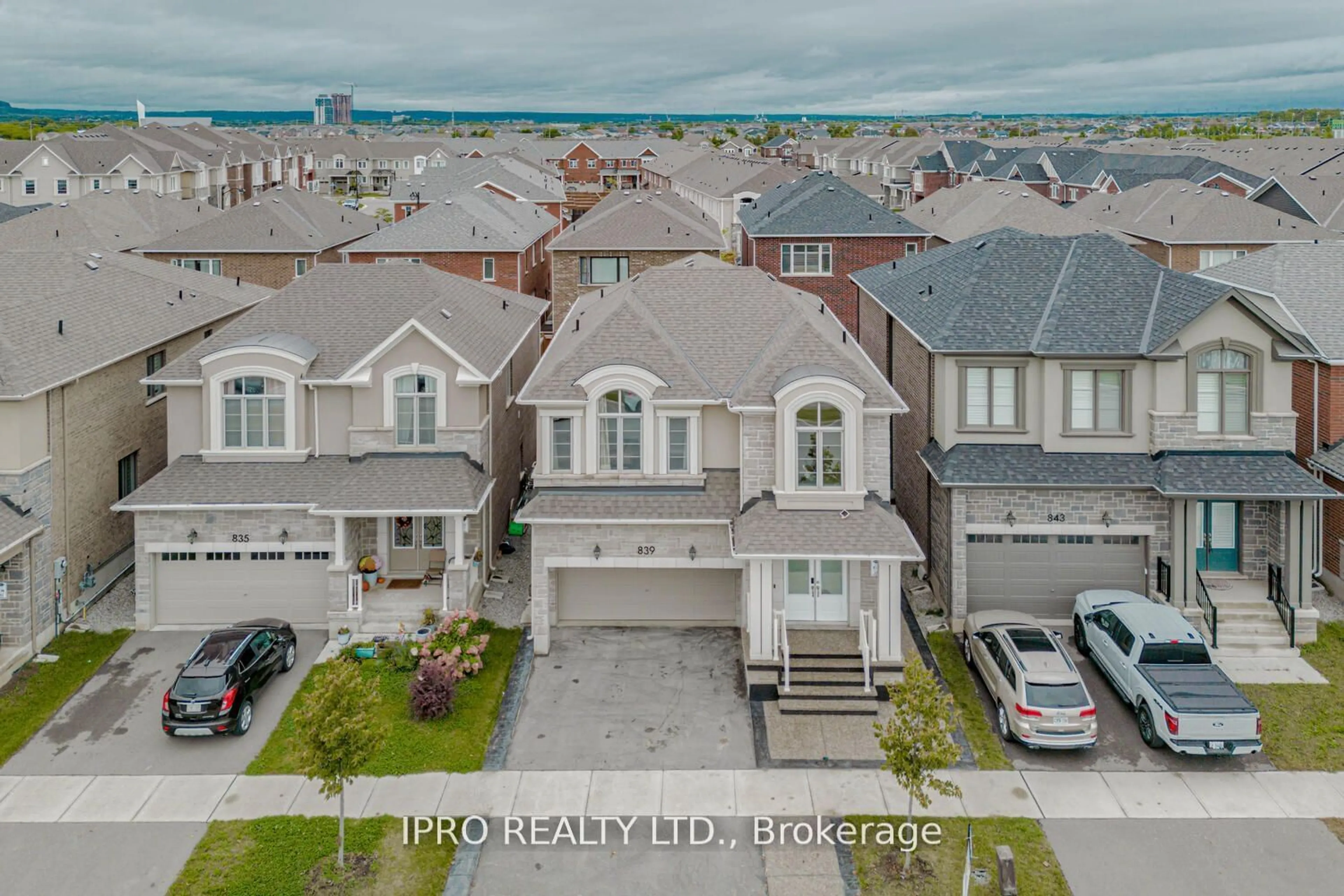 Frontside or backside of a home, the street view for 839 Whitlock Ave, Milton Ontario L9E 1R8