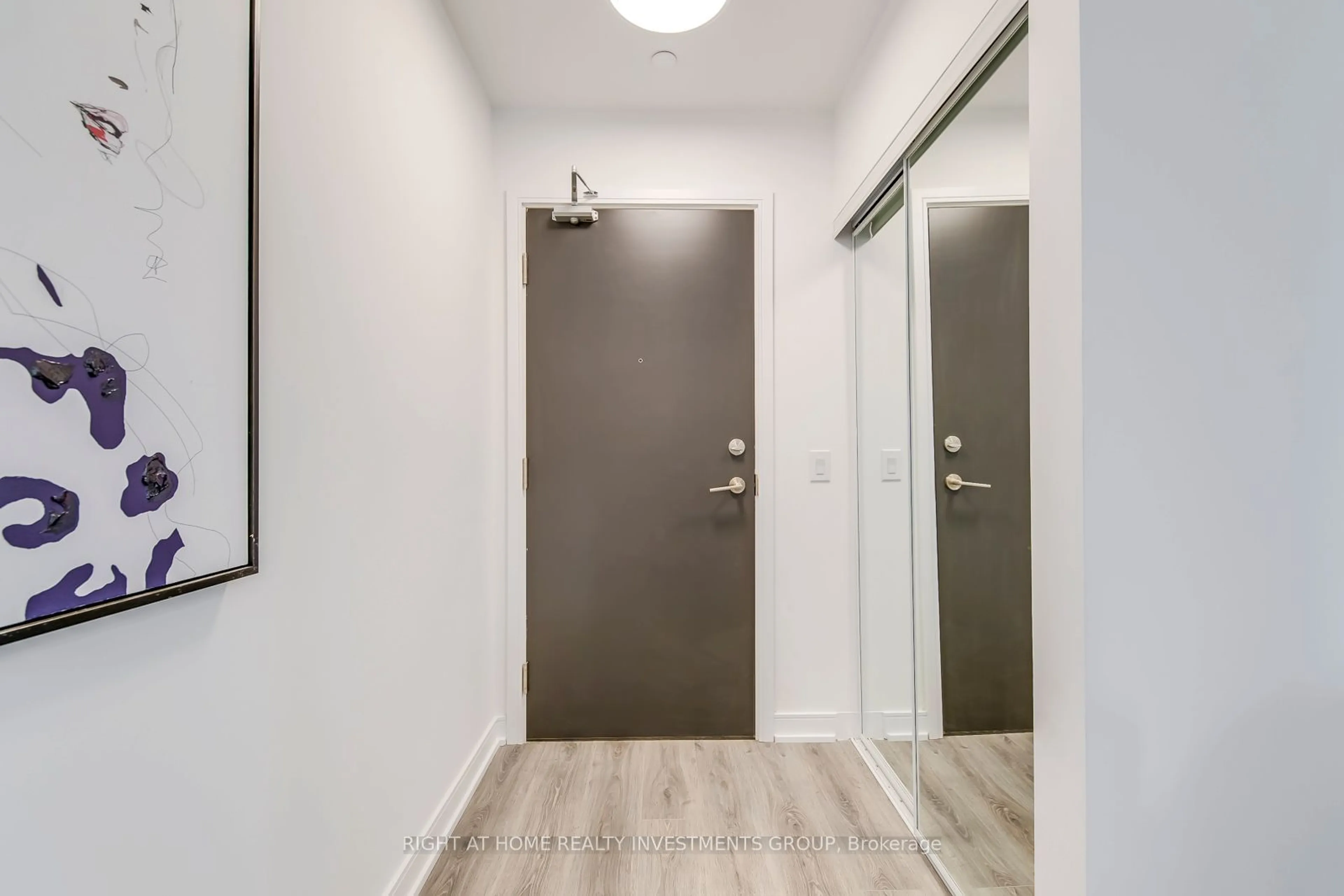 Indoor entryway, wood floors for 25 Neighbourhood Lane #414, Toronto Ontario M8Y 0C4