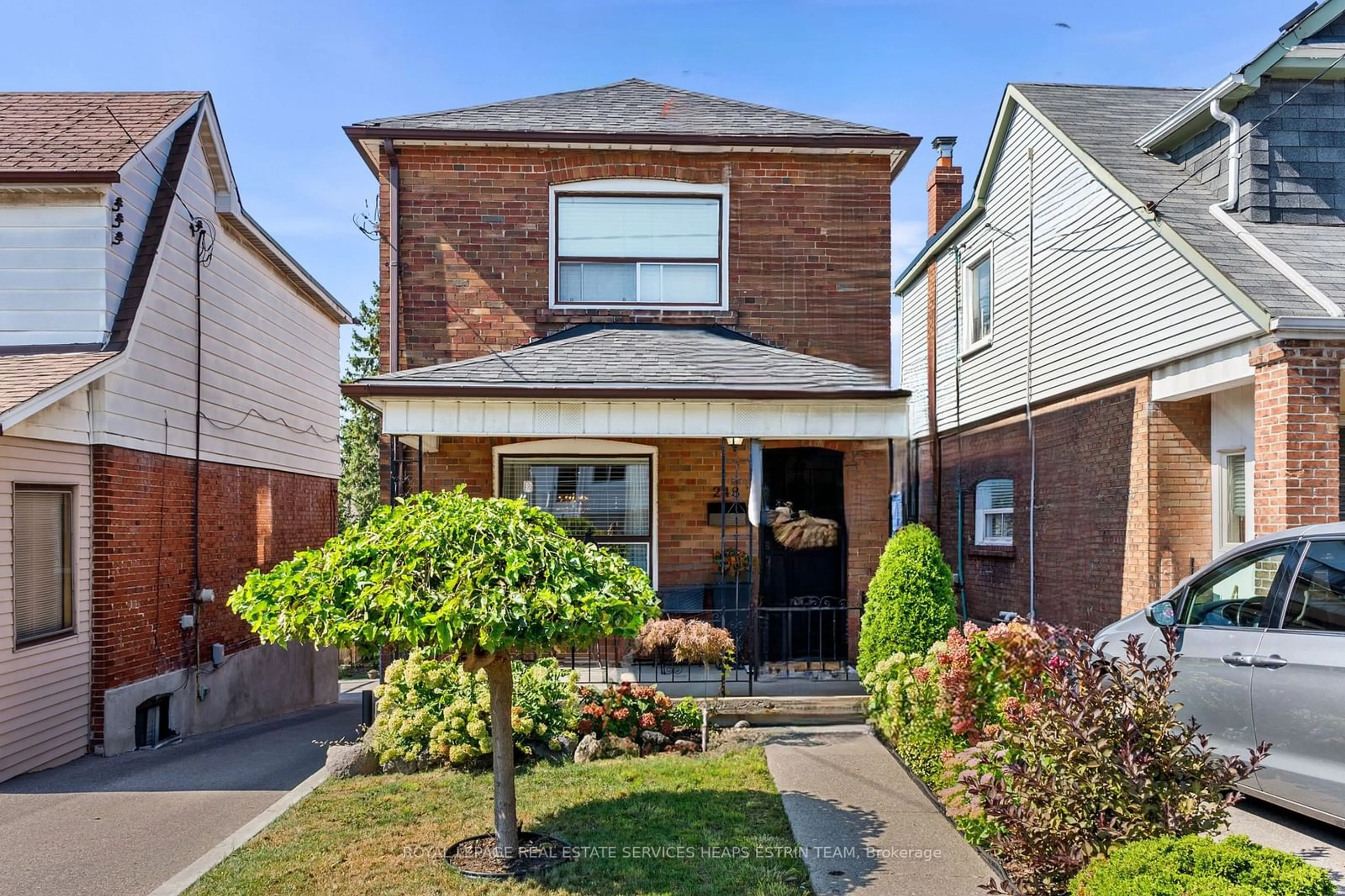 Home with brick exterior material for 248 Blackthorn Ave, Toronto Ontario M6N 3H8