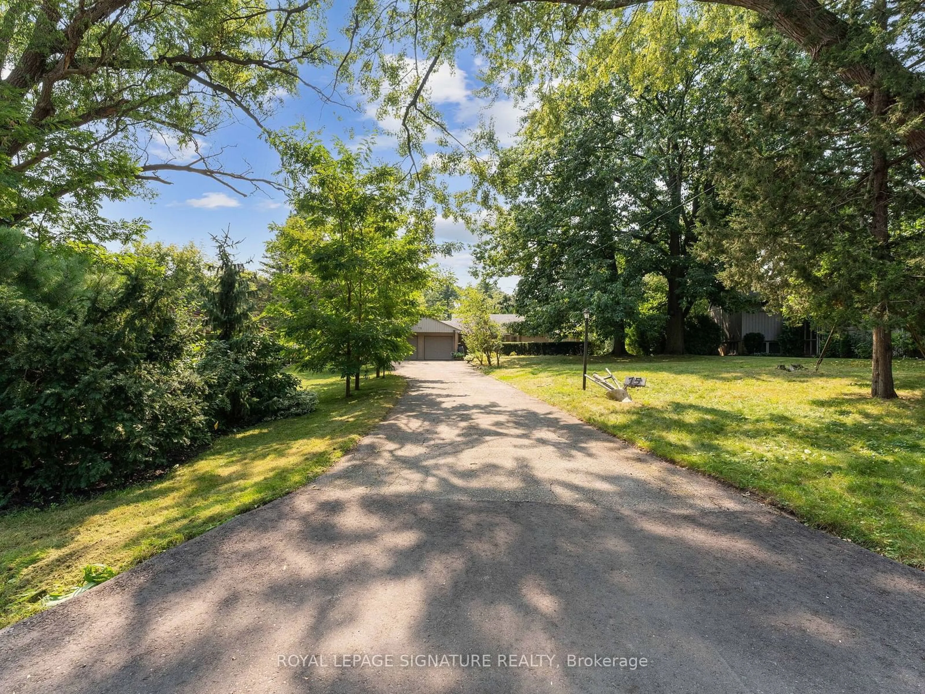 Frontside or backside of a home, the street view for 75 Leggett Ave, Toronto Ontario M9P 1X4