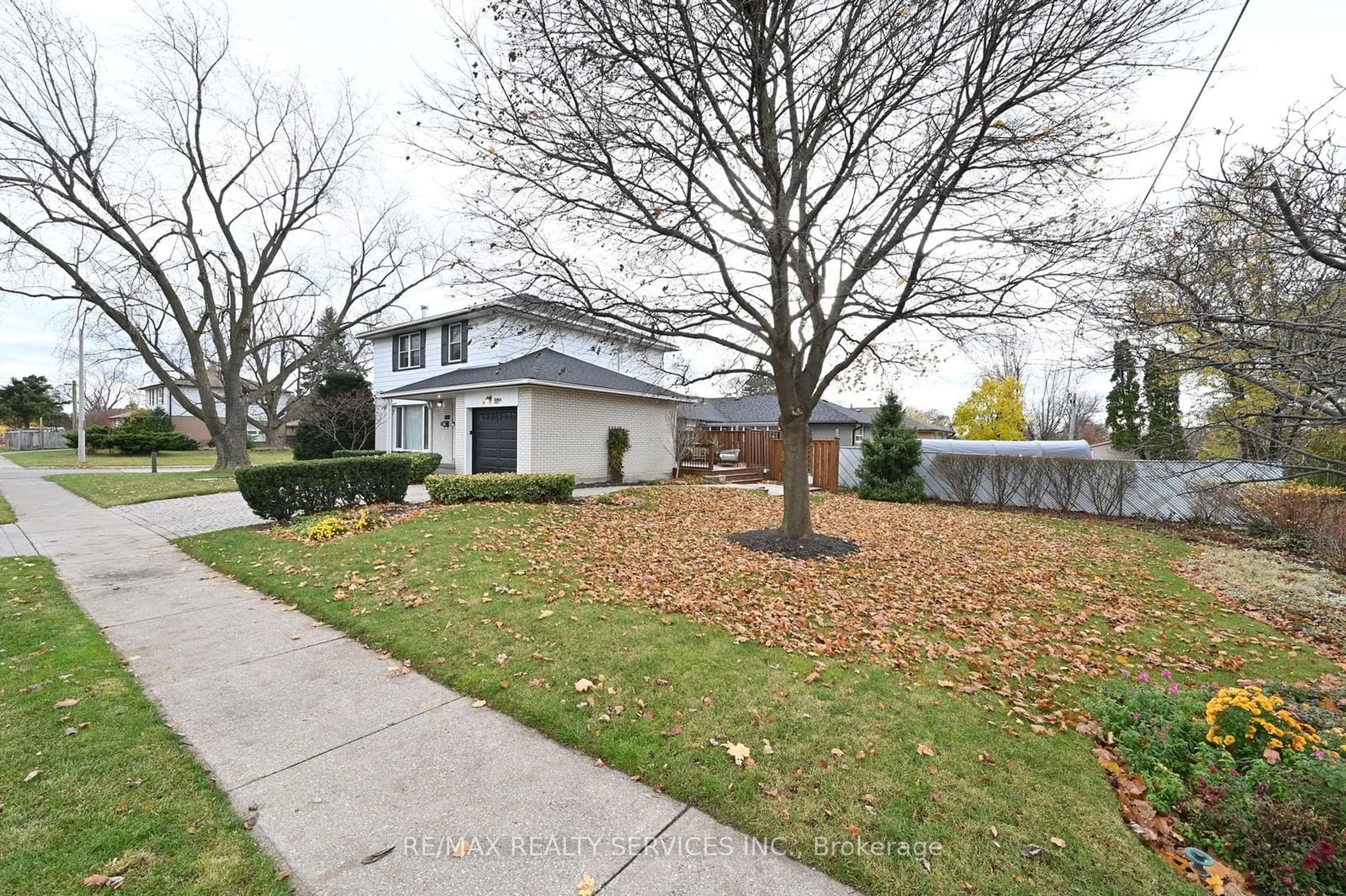 Frontside or backside of a home, the fenced backyard for 47 Durham Cres, Brampton Ontario L6T 2X7