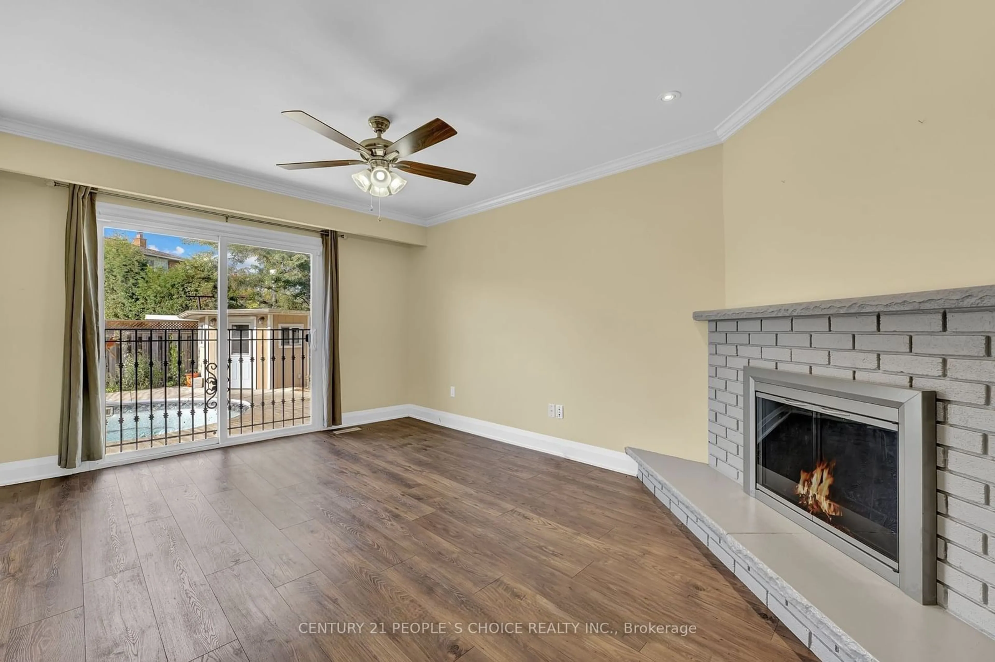 A pic of a room, wood floors for 44 Linkdale Rd, Brampton Ontario L6V 2Y6