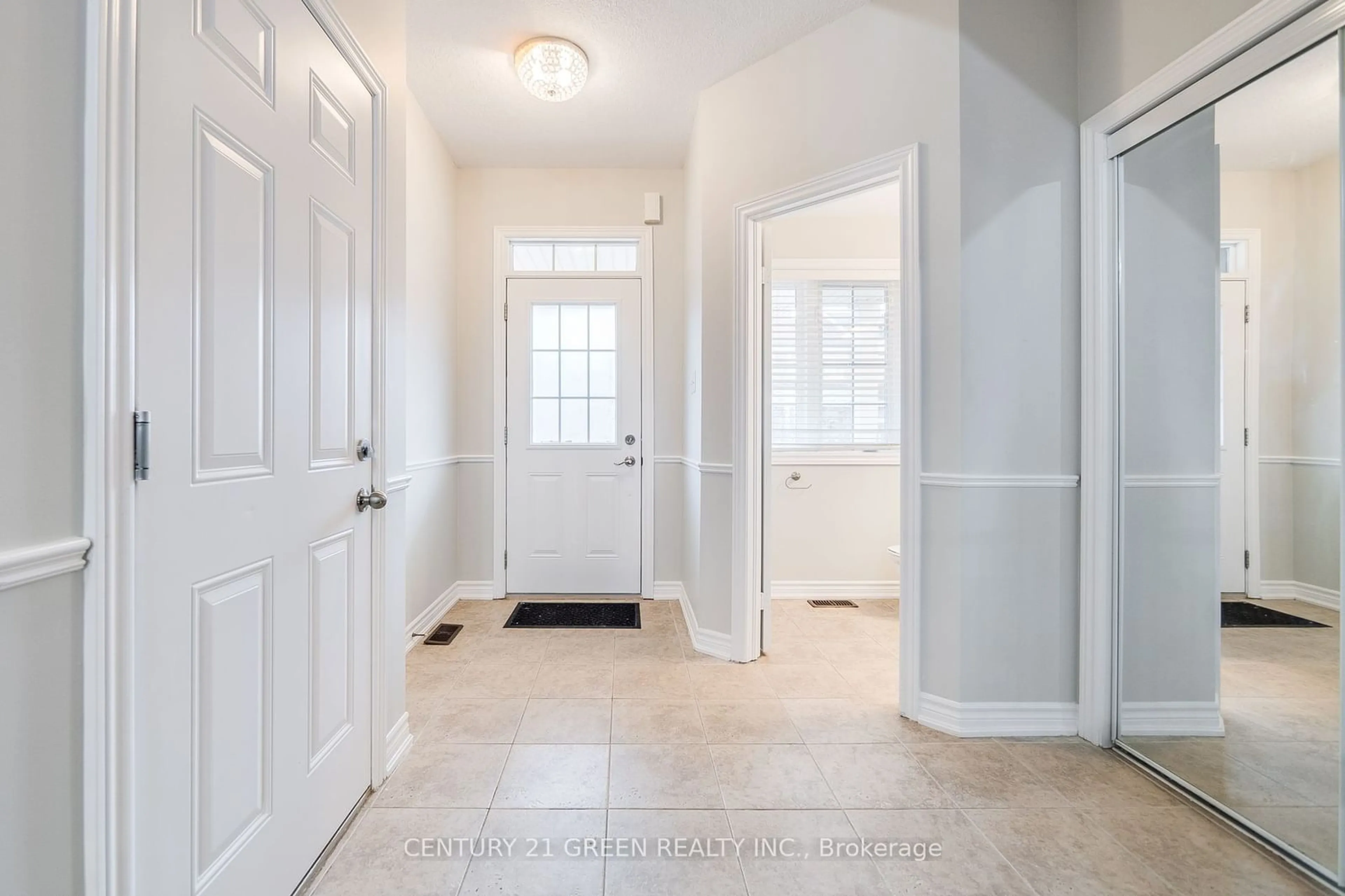 Indoor entryway, wood floors for 569 Murray Meadows Pl, Milton Ontario L9T 8L8