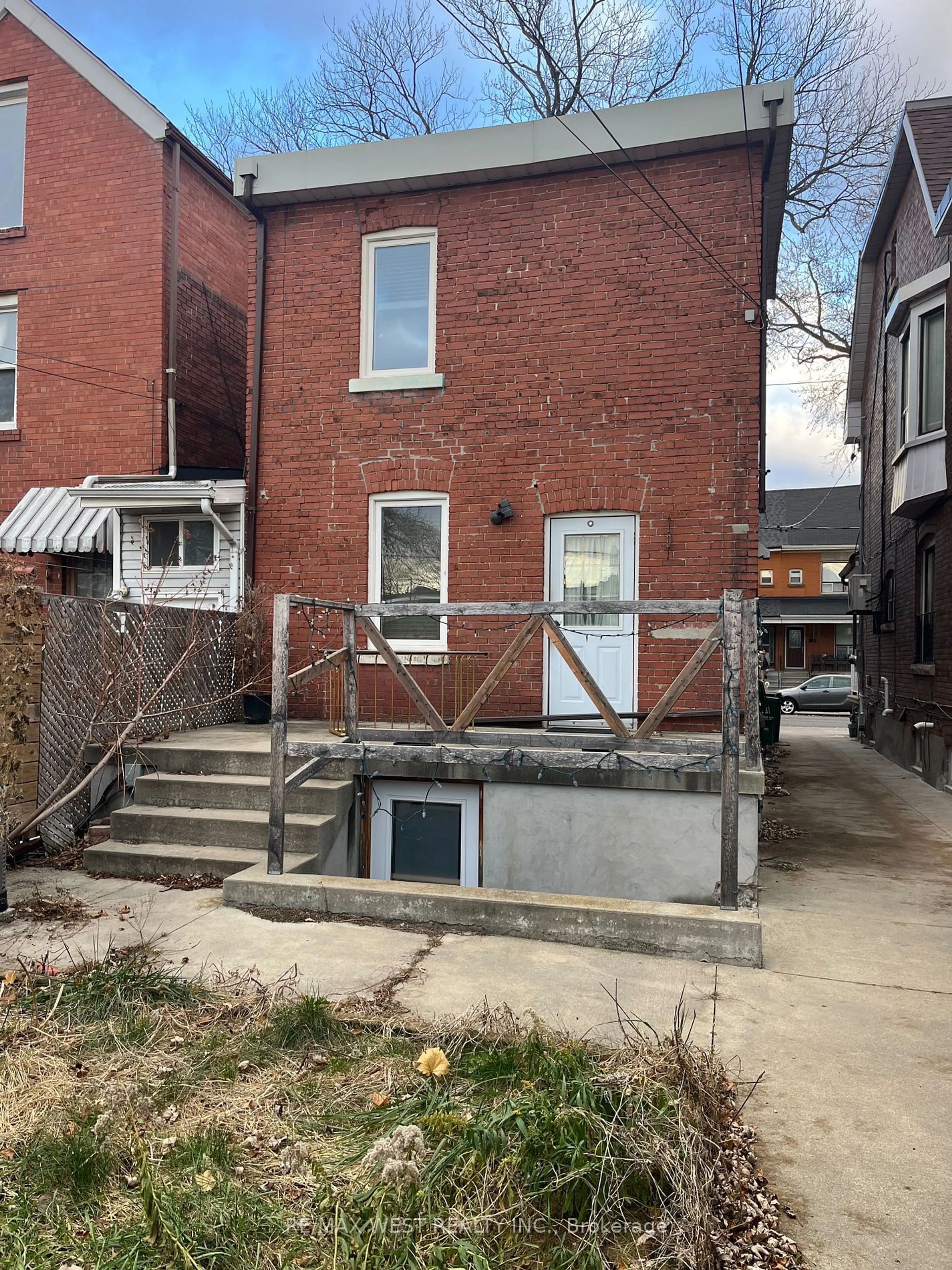 Frontside or backside of a home, the fenced backyard for 46 Salem Ave, Toronto Ontario M6H 3C1