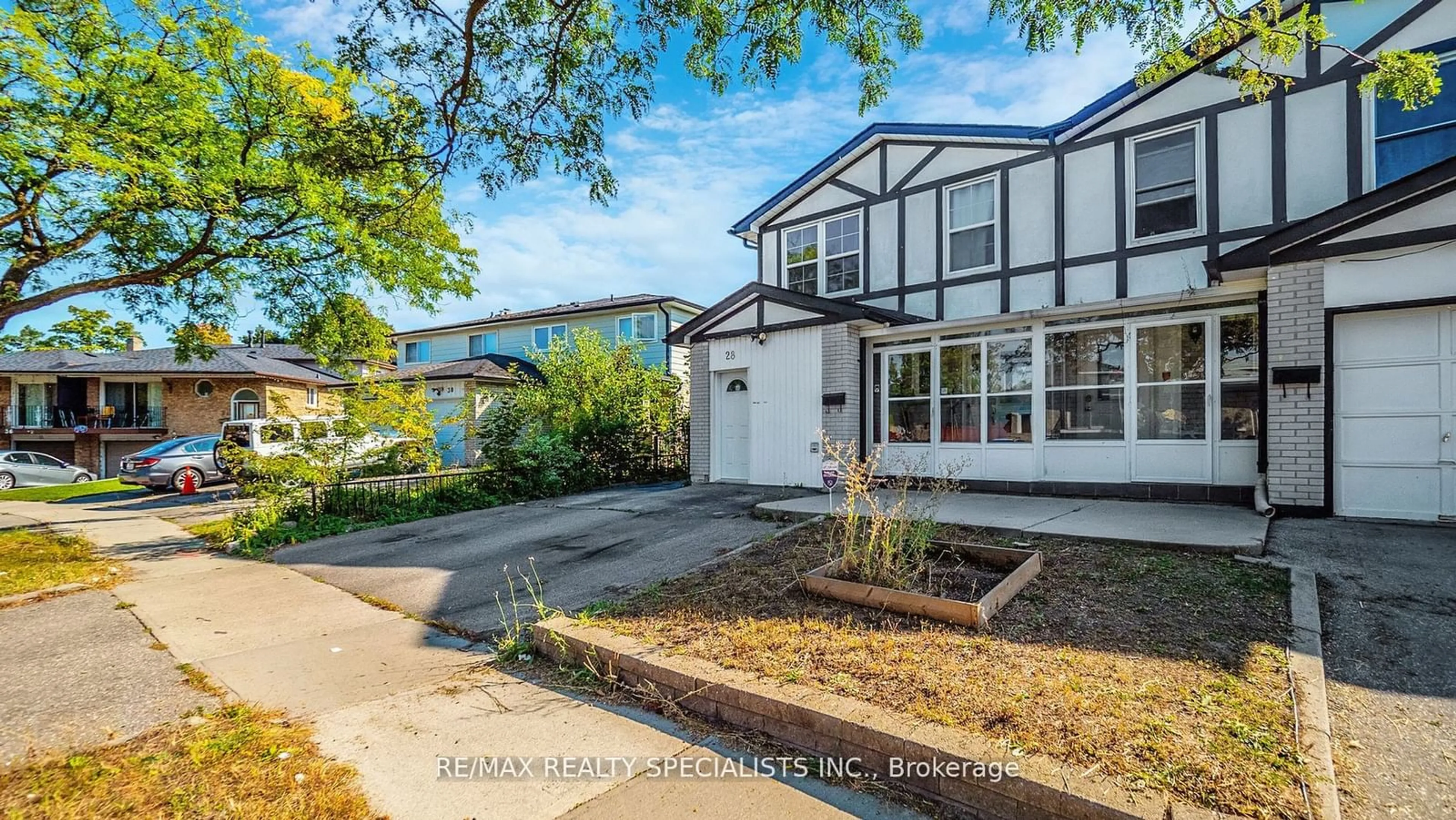 Frontside or backside of a home, the fenced backyard for 28 Abell Dr, Brampton Ontario L6V 2V8