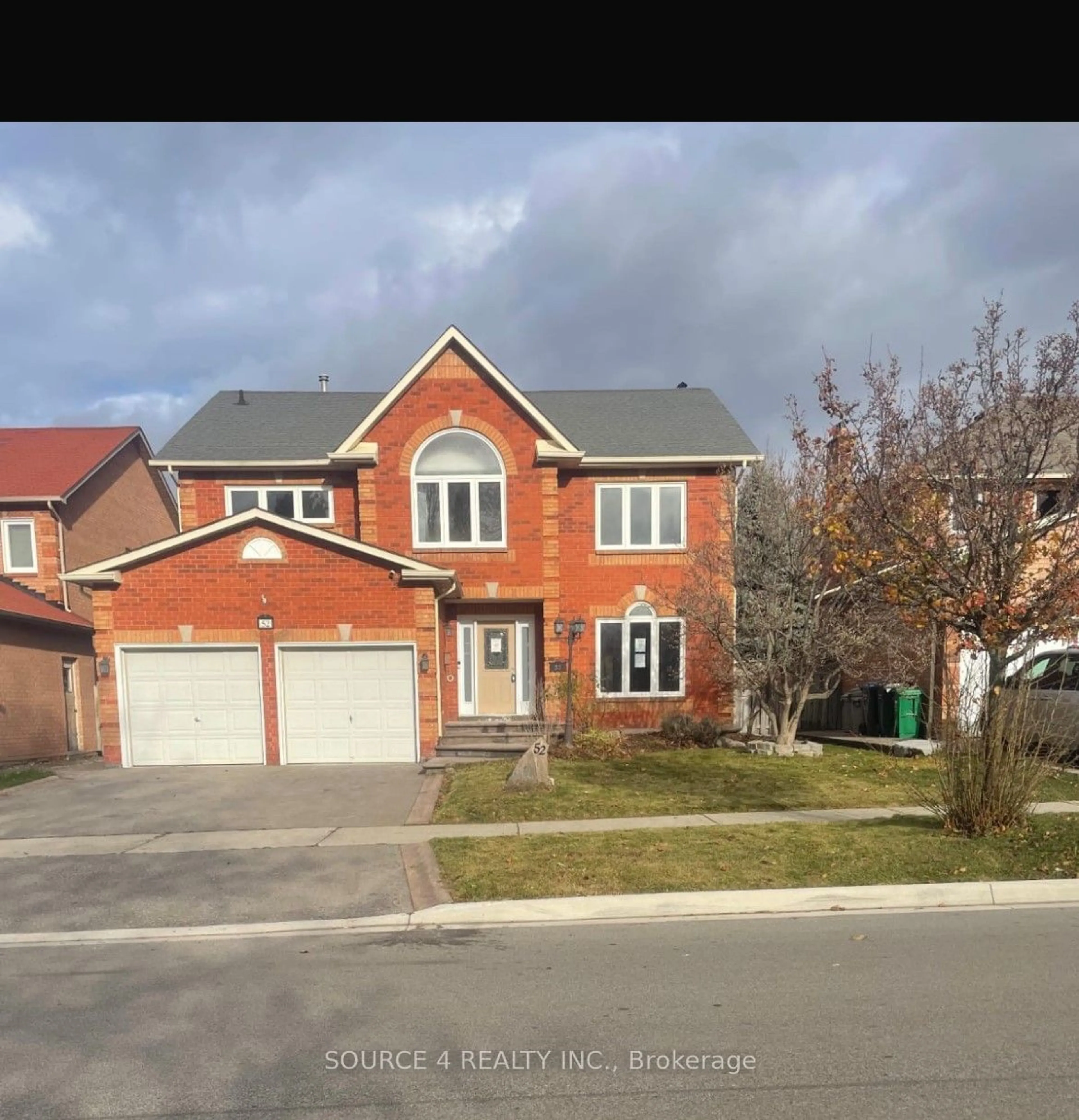 Frontside or backside of a home, the street view for 52 Kenpark Ave, Brampton Ontario L6Z 3L4