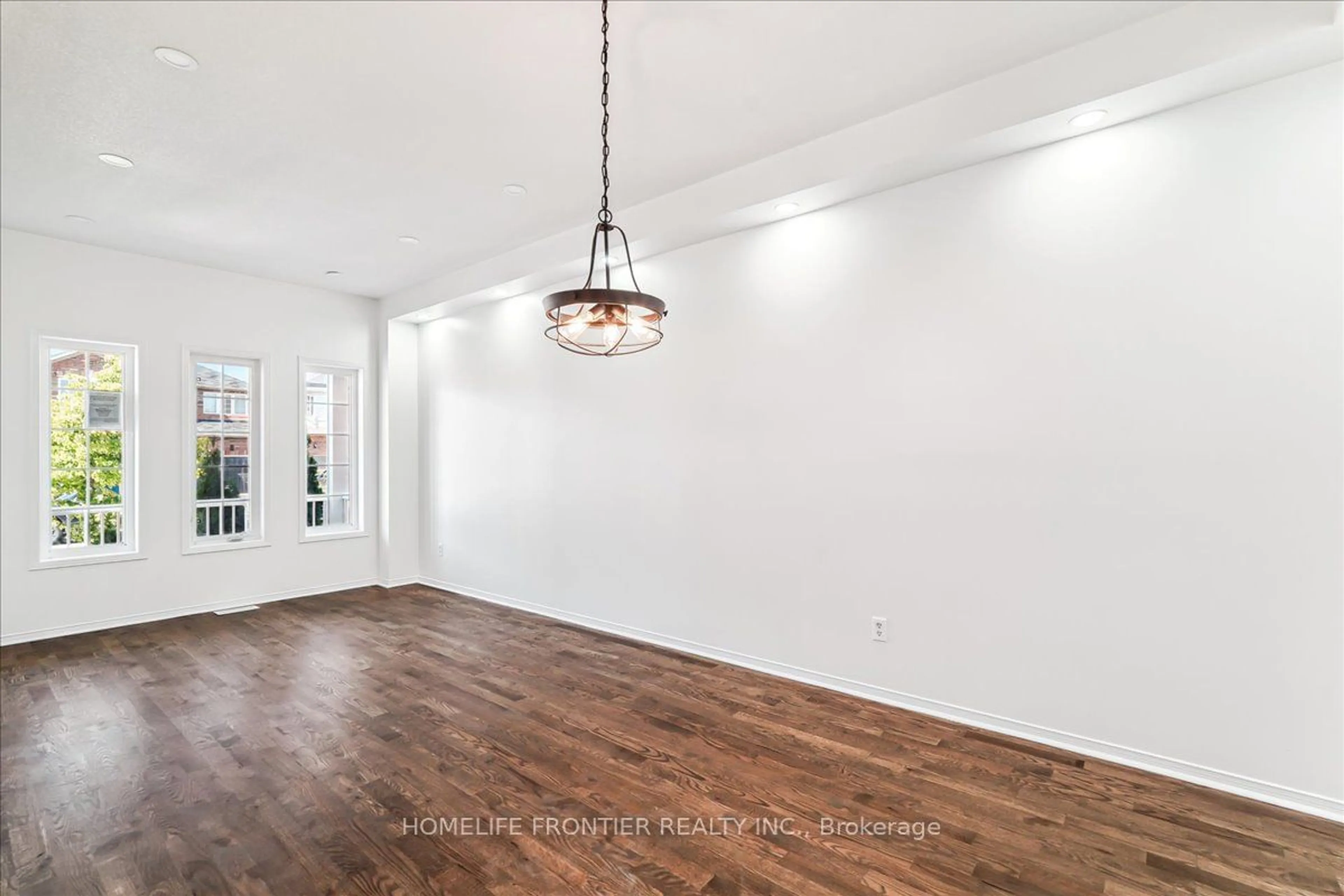 A pic of a room, wood floors for 9 Owens Rd, Brampton Ontario L6X 0S1