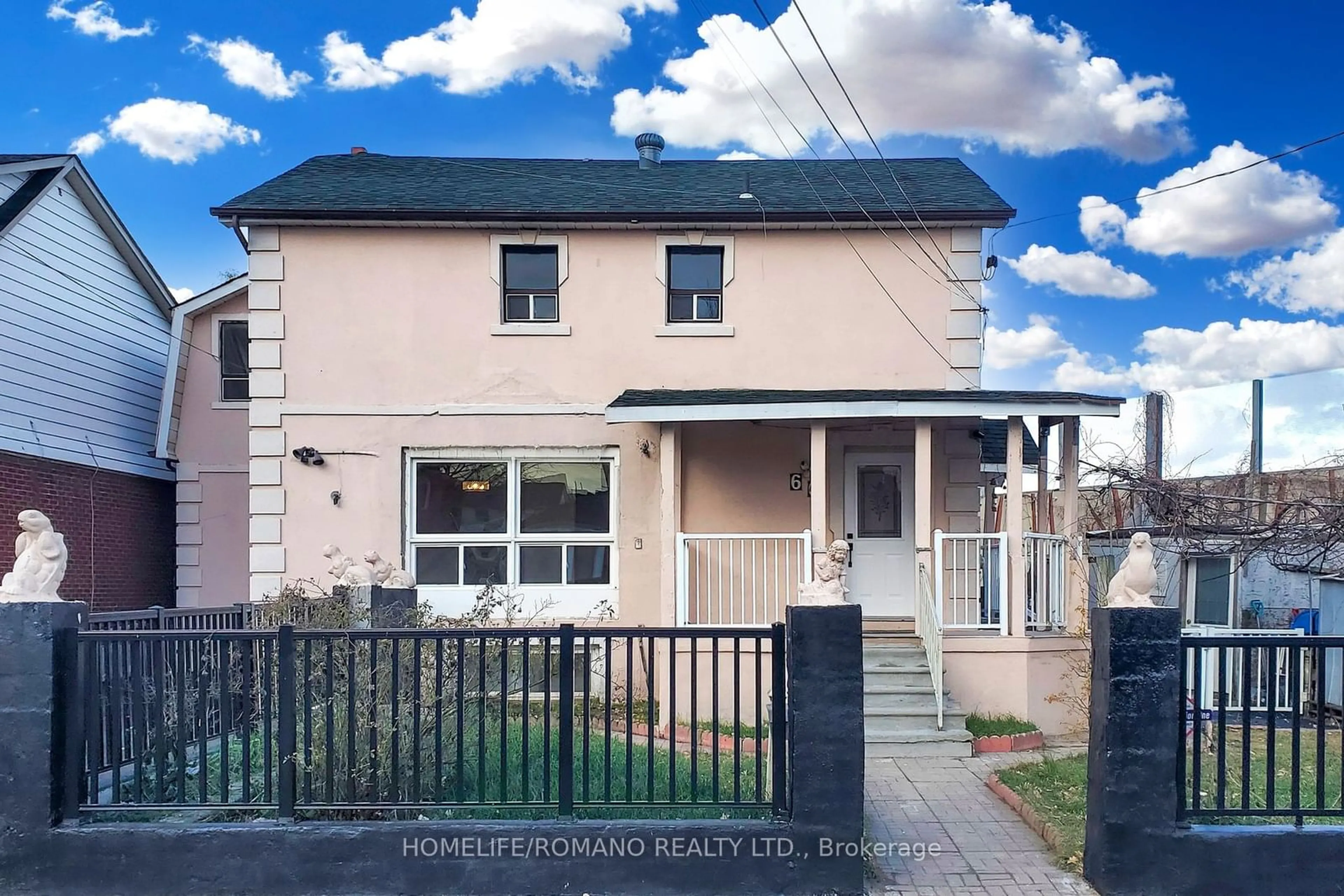 Frontside or backside of a home, the fenced backyard for 66 Mahoney Ave, Toronto Ontario M6M 2H4