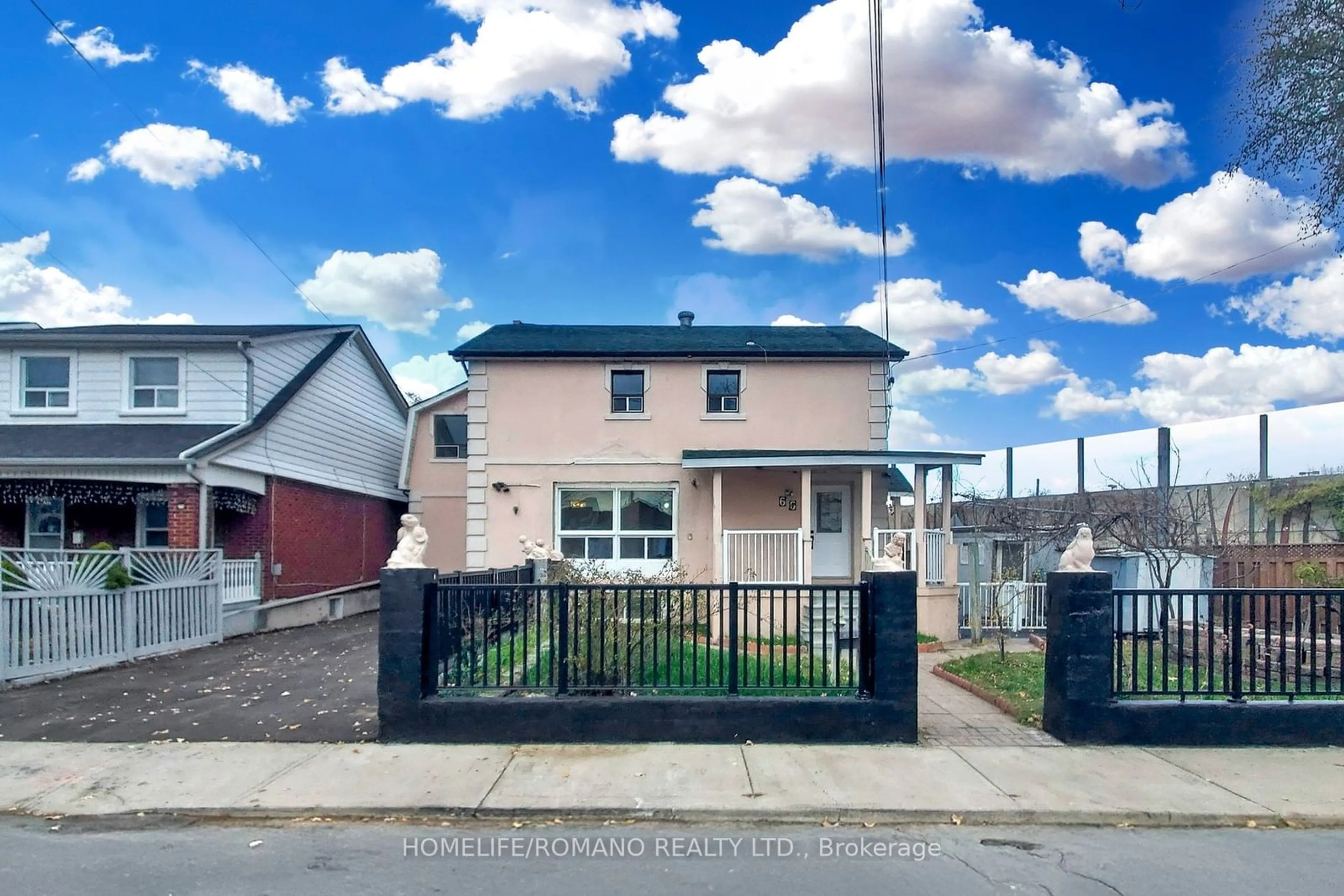 A pic from exterior of the house or condo, the fenced backyard for 66 Mahoney Ave, Toronto Ontario M6M 2H4