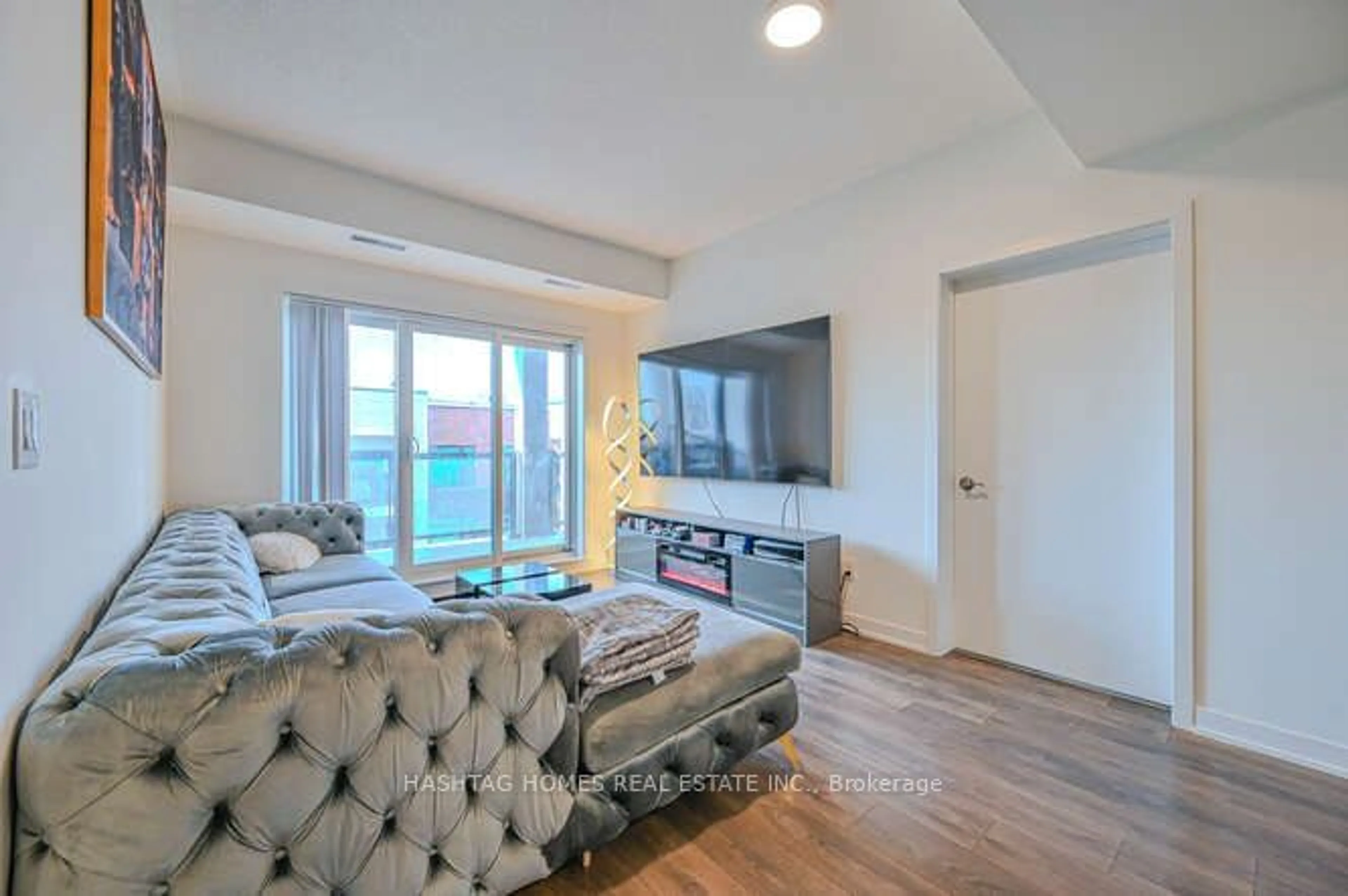 Living room, wood floors for 120 Canon Jackson Dr #404, Toronto Ontario M6M 0B8