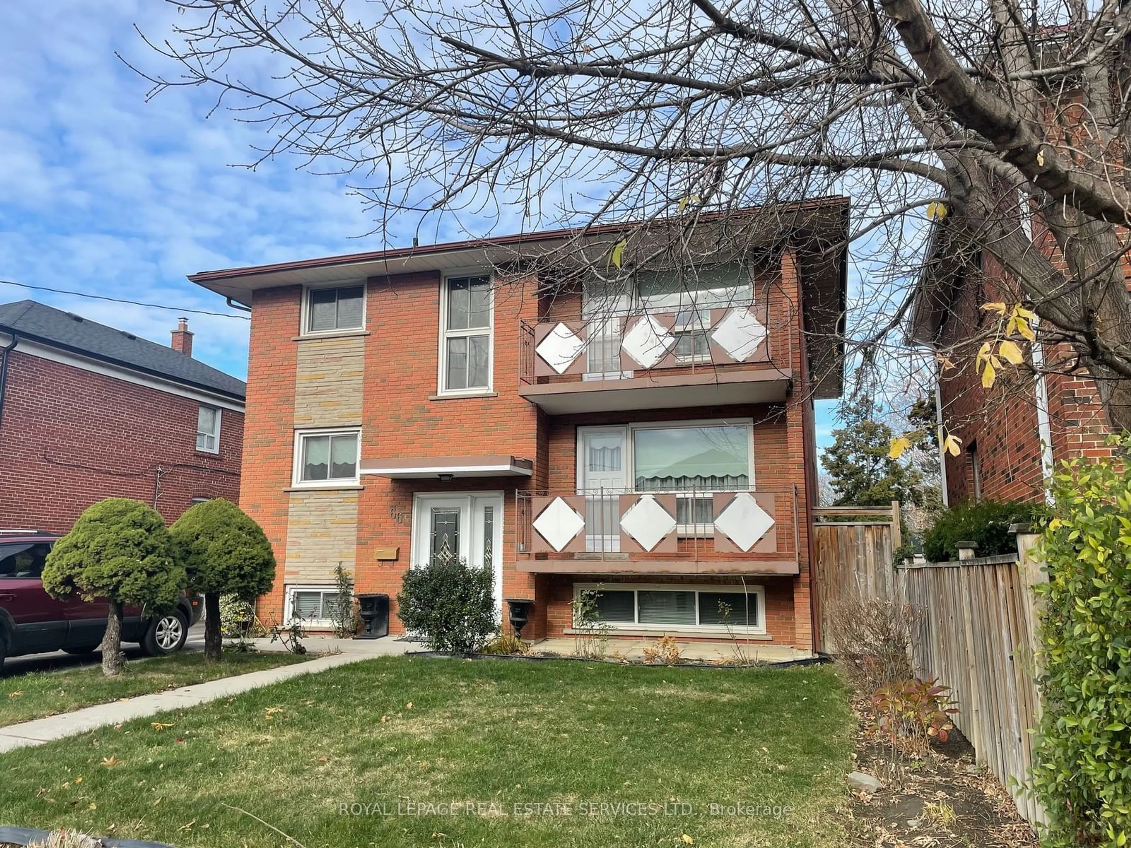 Home with brick exterior material for 66 Evans Ave, Toronto Ontario M8Z 1H6