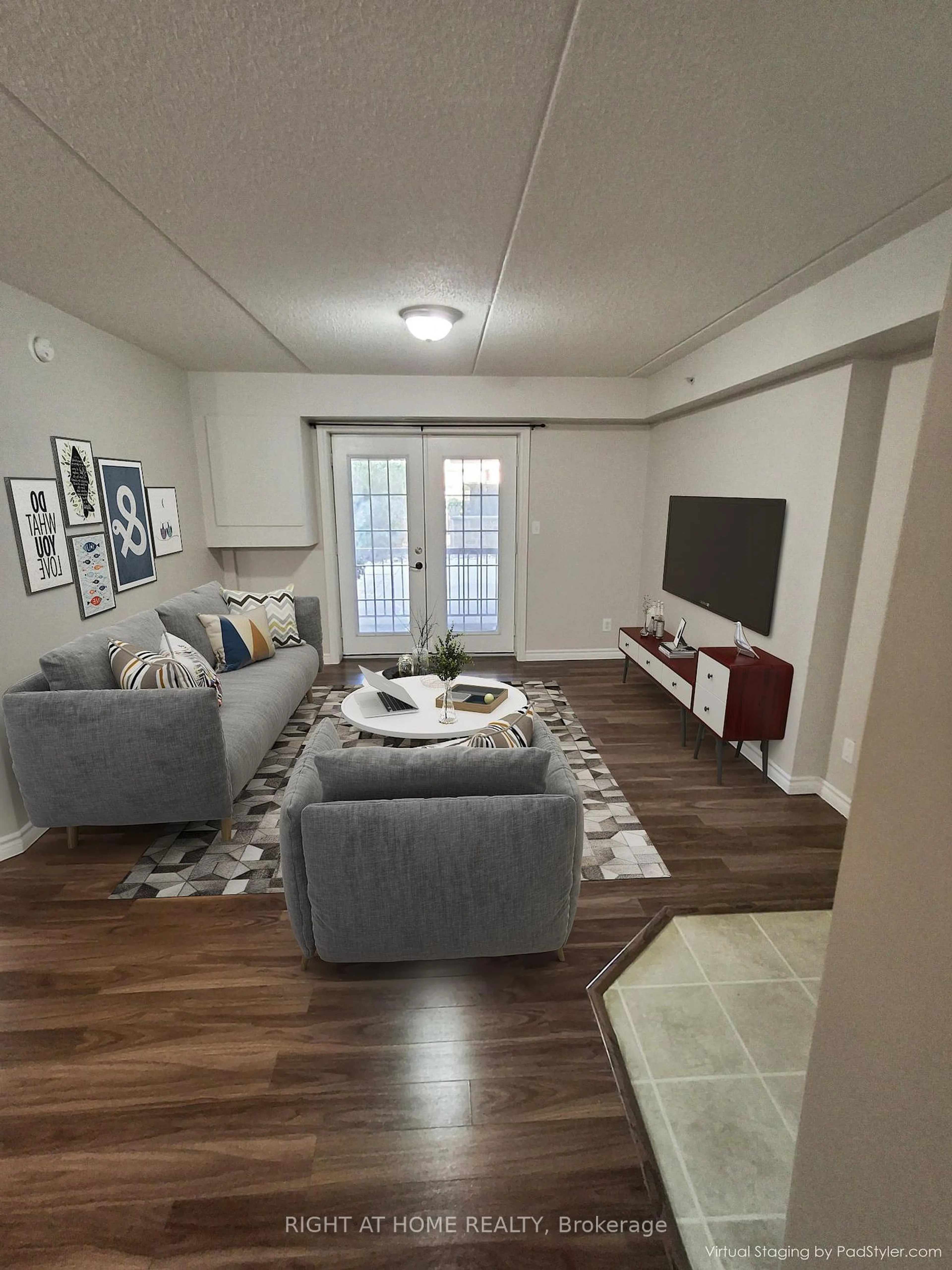 Living room, wood floors for 1480 Bishops Gate #108, Oakville Ontario L6M 4N4