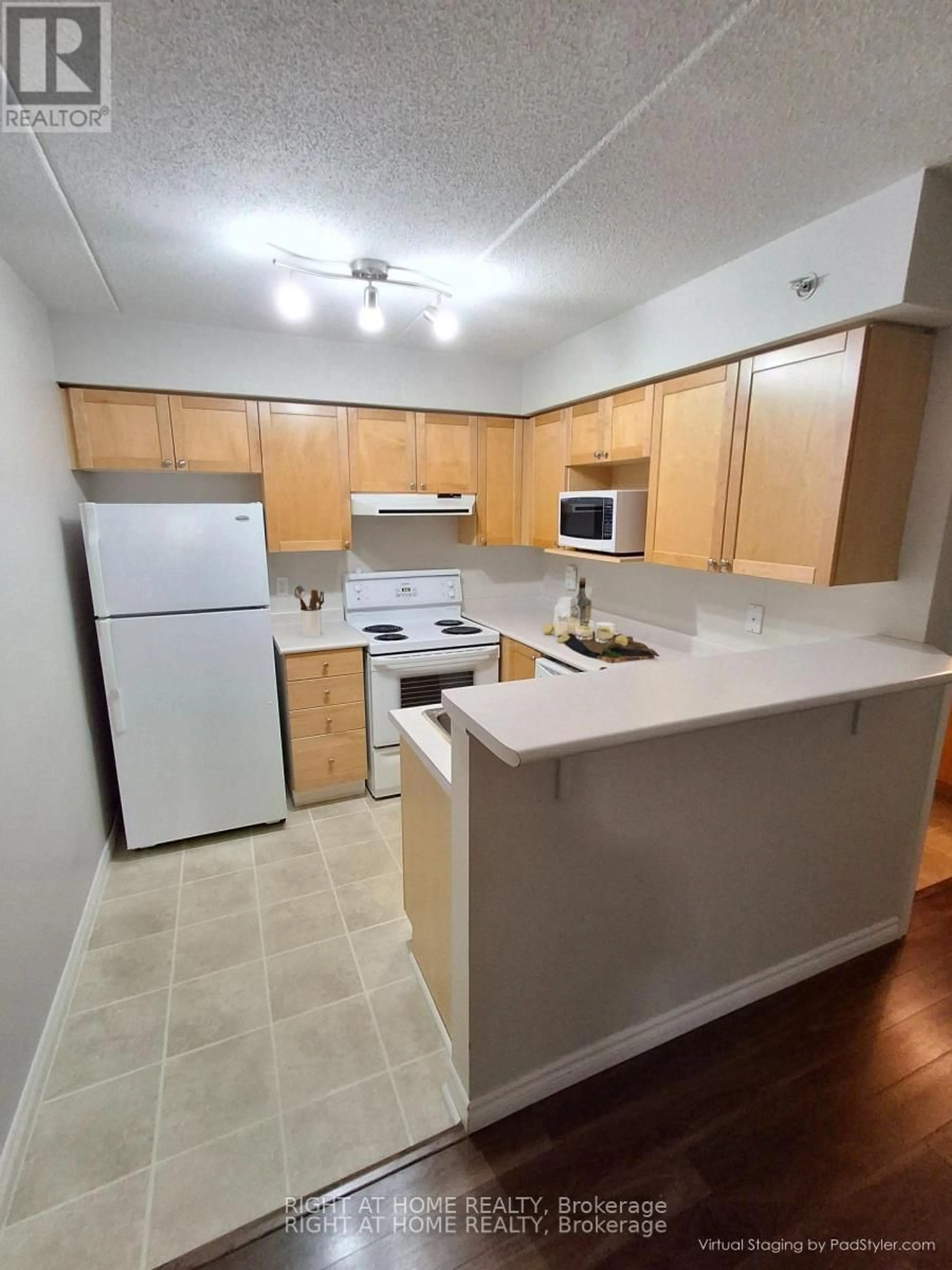 Standard kitchen, wood floors for 1480 Bishops Gate #108, Oakville Ontario L6M 4N4