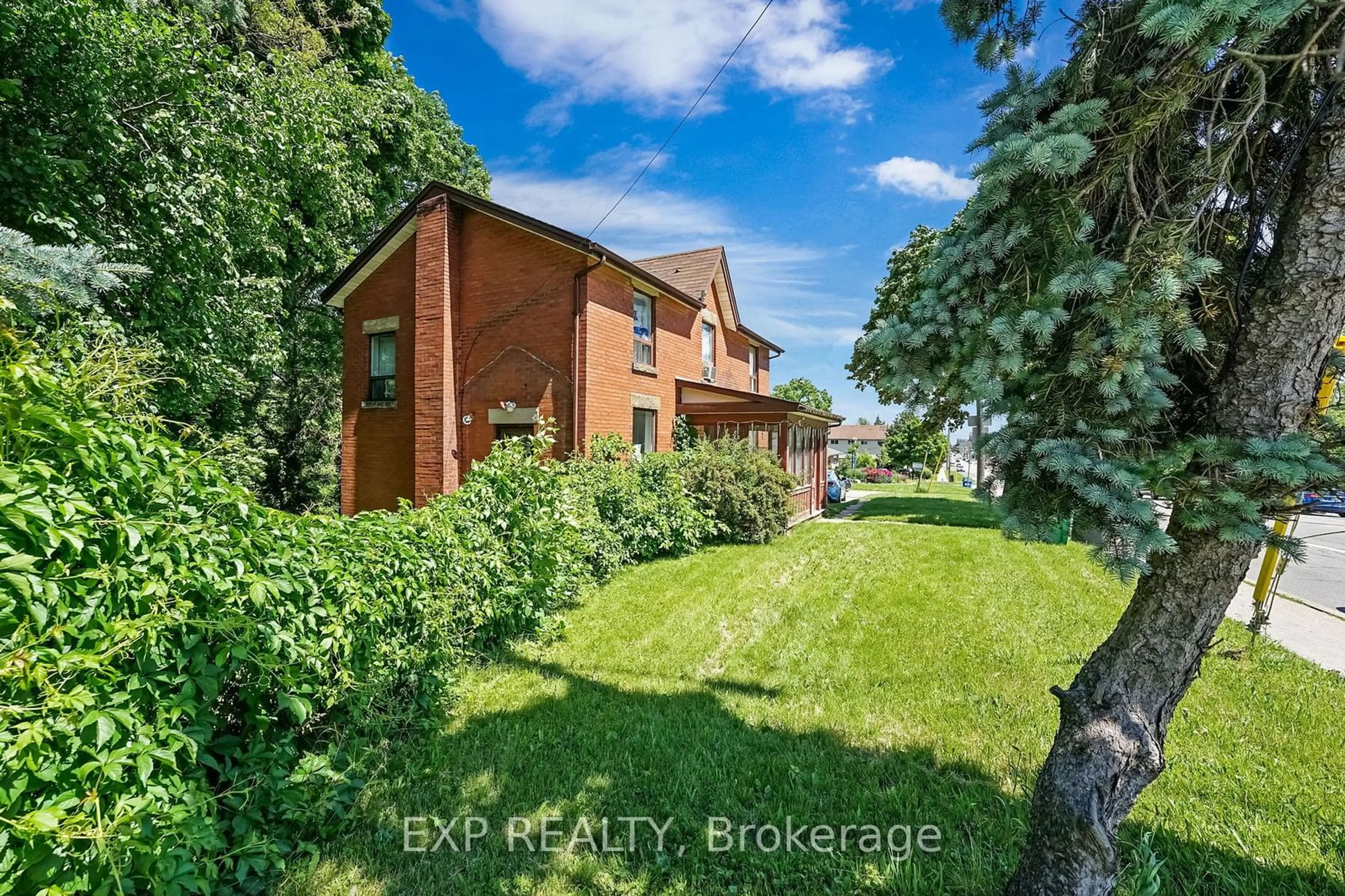 Frontside or backside of a home, the fenced backyard for 486 Main St, Brampton Ontario L6V 1P8