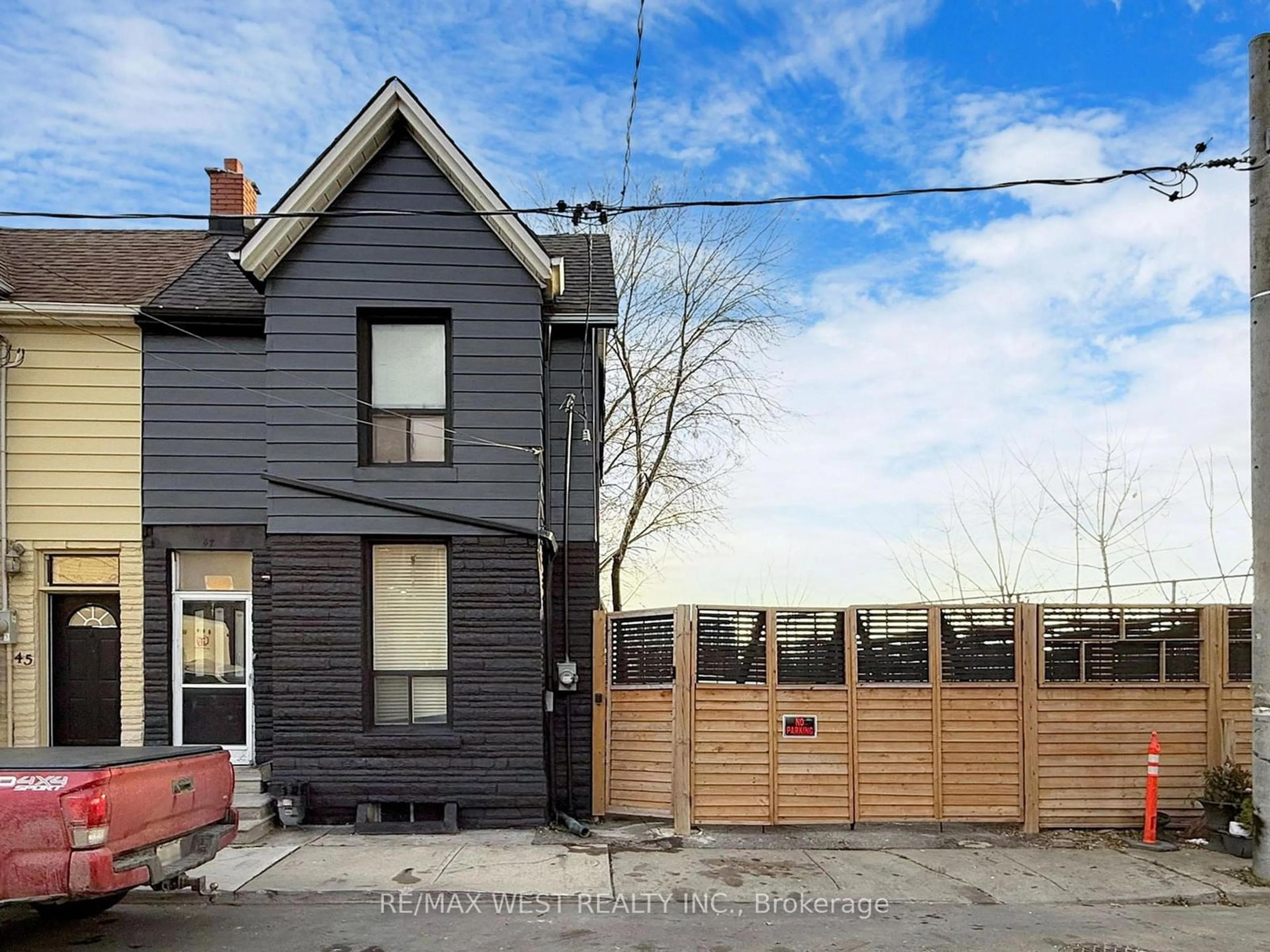 Frontside or backside of a home, the fenced backyard for 47 Lindner St, Toronto Ontario M6N 1B3