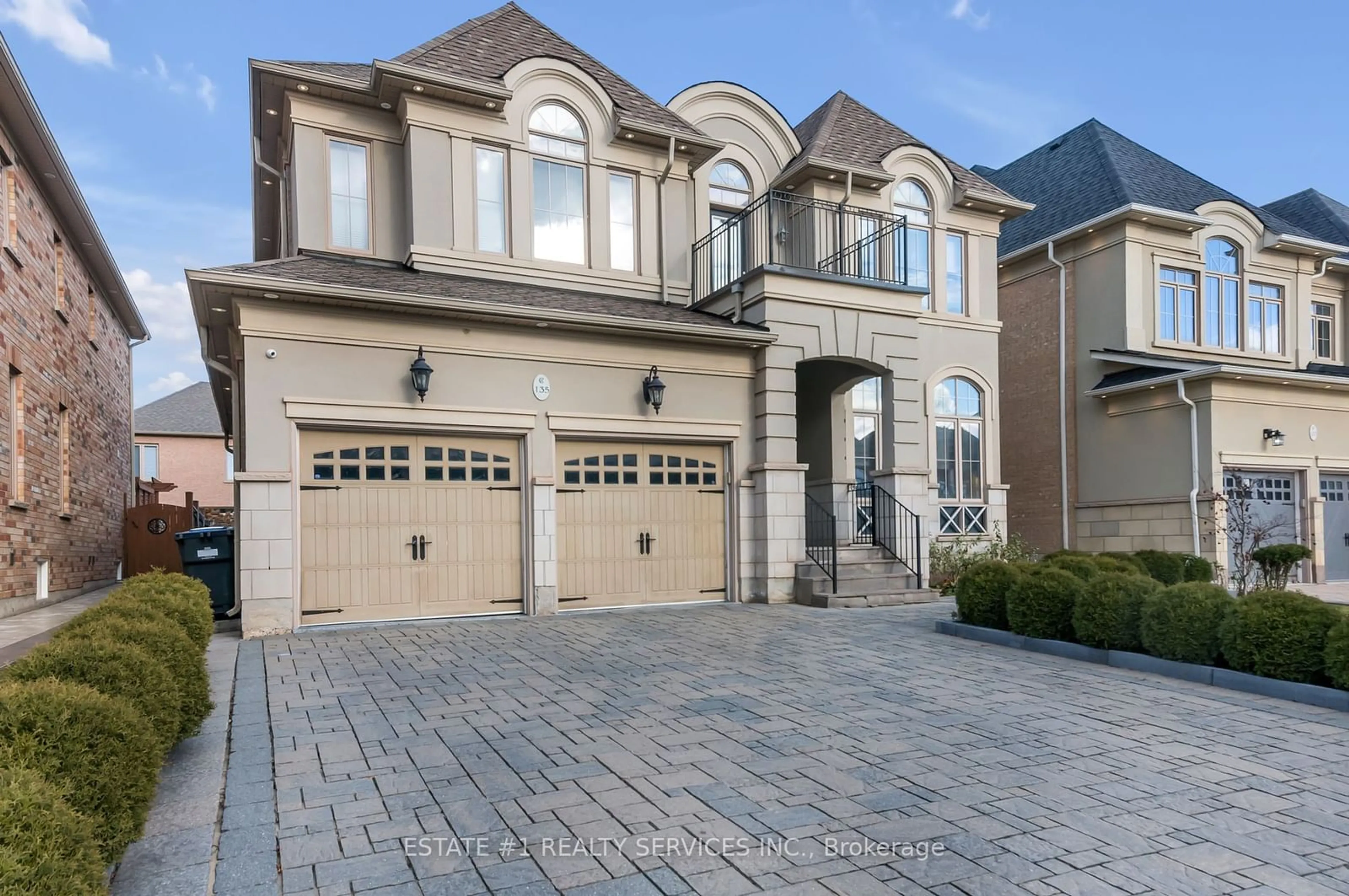 Home with brick exterior material for 135 Elbern Markell Dr, Brampton Ontario L6X 0X5