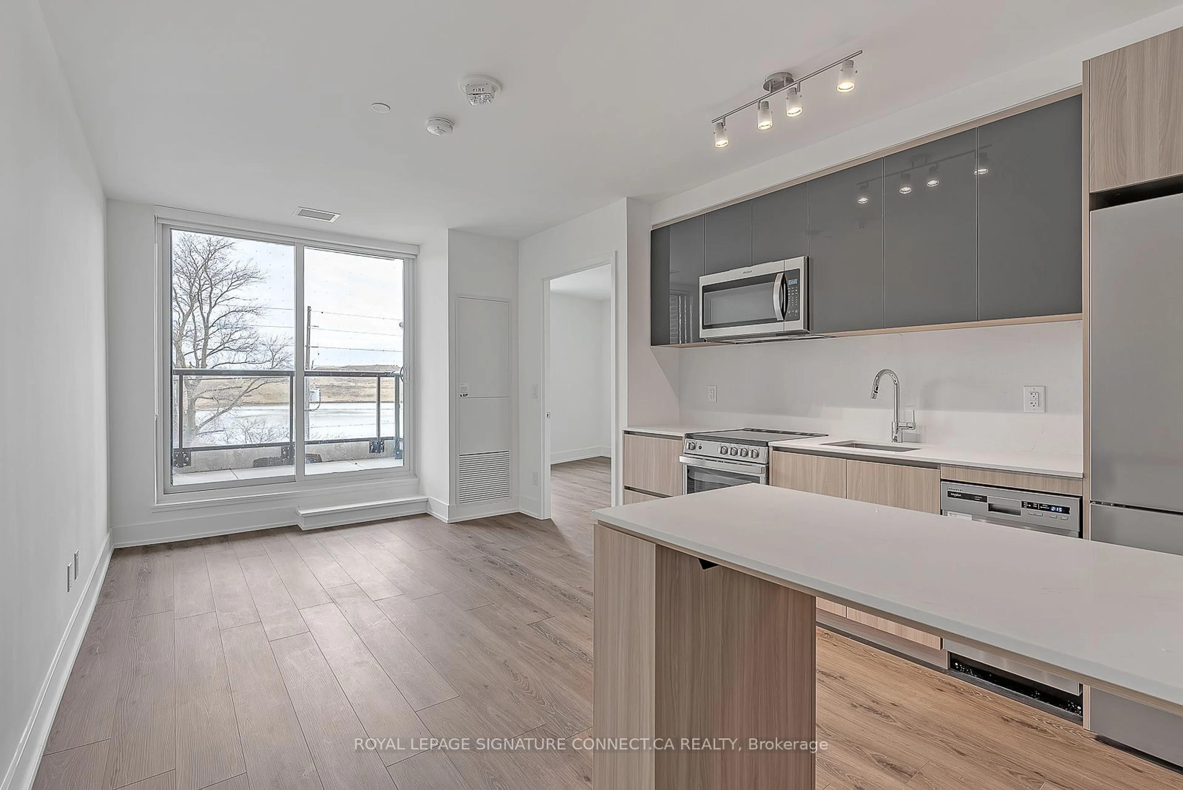 Open concept kitchen for 3100 Keele St #325, Toronto Ontario M3M 2H4