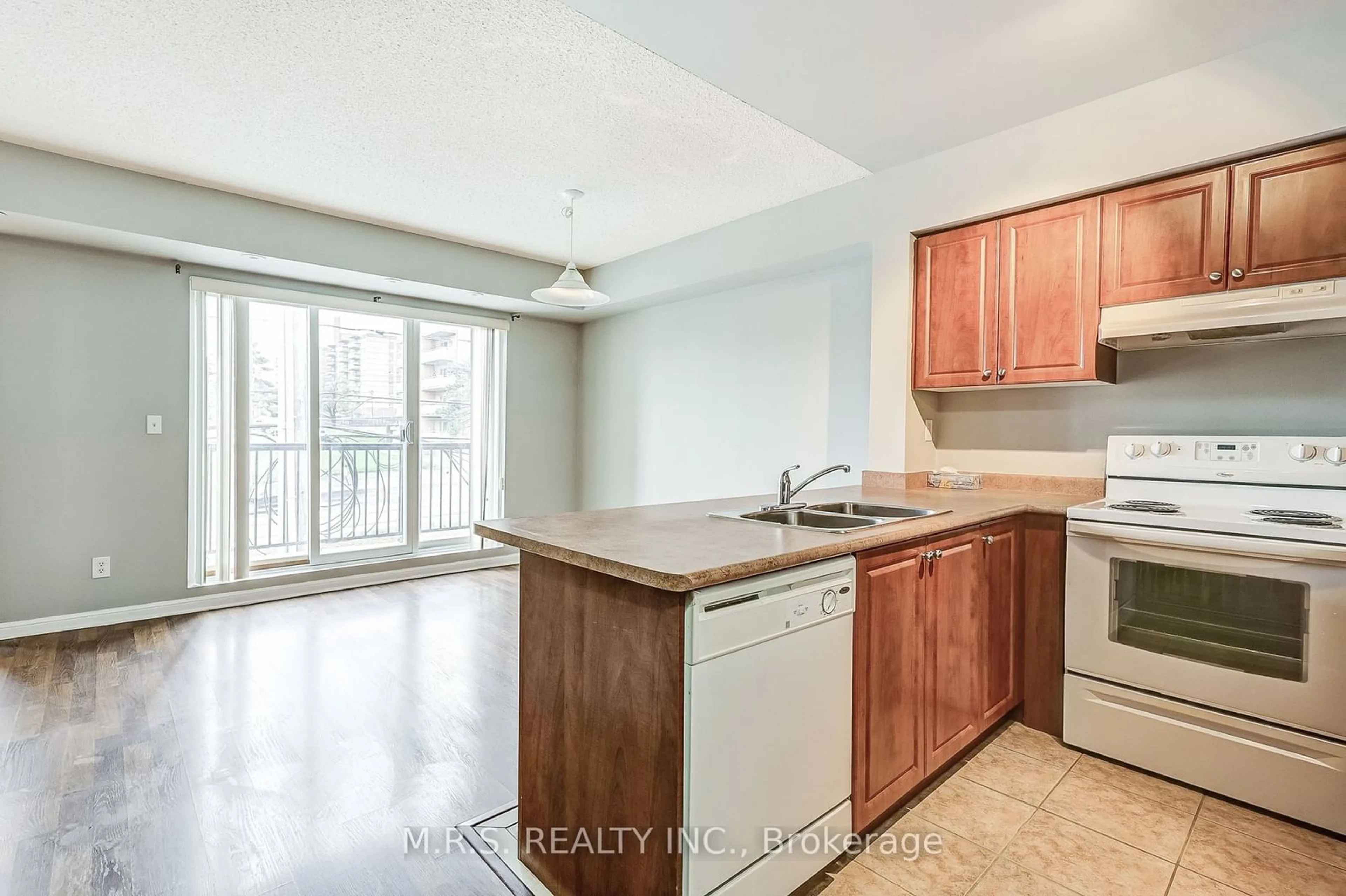 Standard kitchen, wood floors, cottage for 3025 Finch Ave #2038, Toronto Ontario M9M 0A2