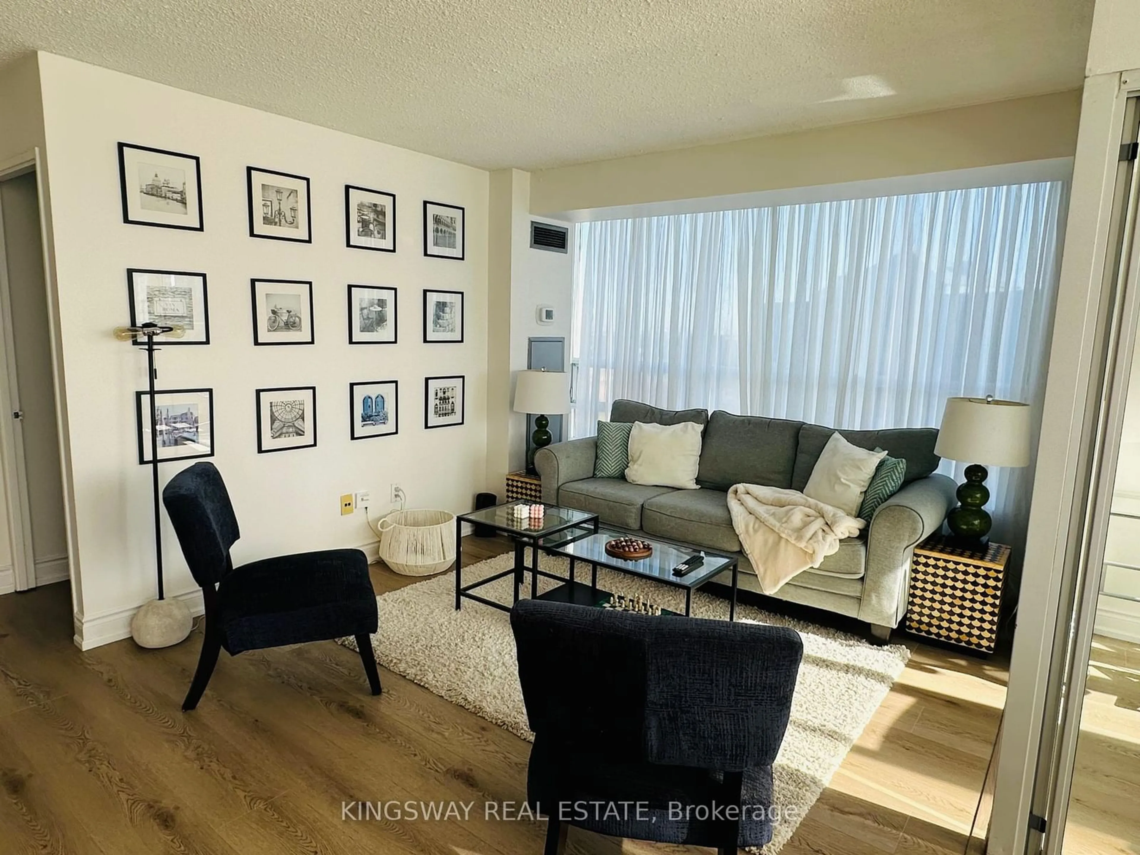 Living room, wood floors for 50 Kingsbridge Garden Circ #1506, Mississauga Ontario L5R 1Y2