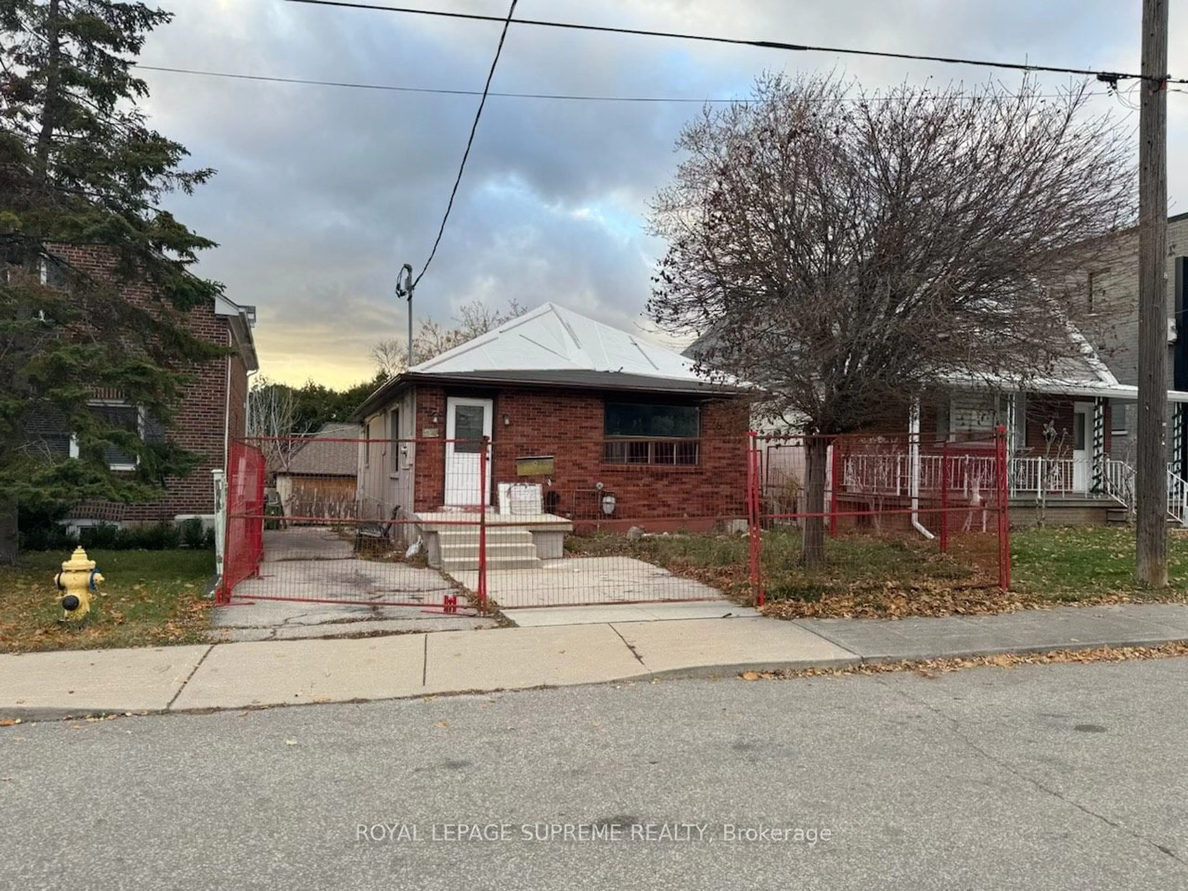 Frontside or backside of a home, the street view for 26 Alyward St, Toronto Ontario M6M 3L2