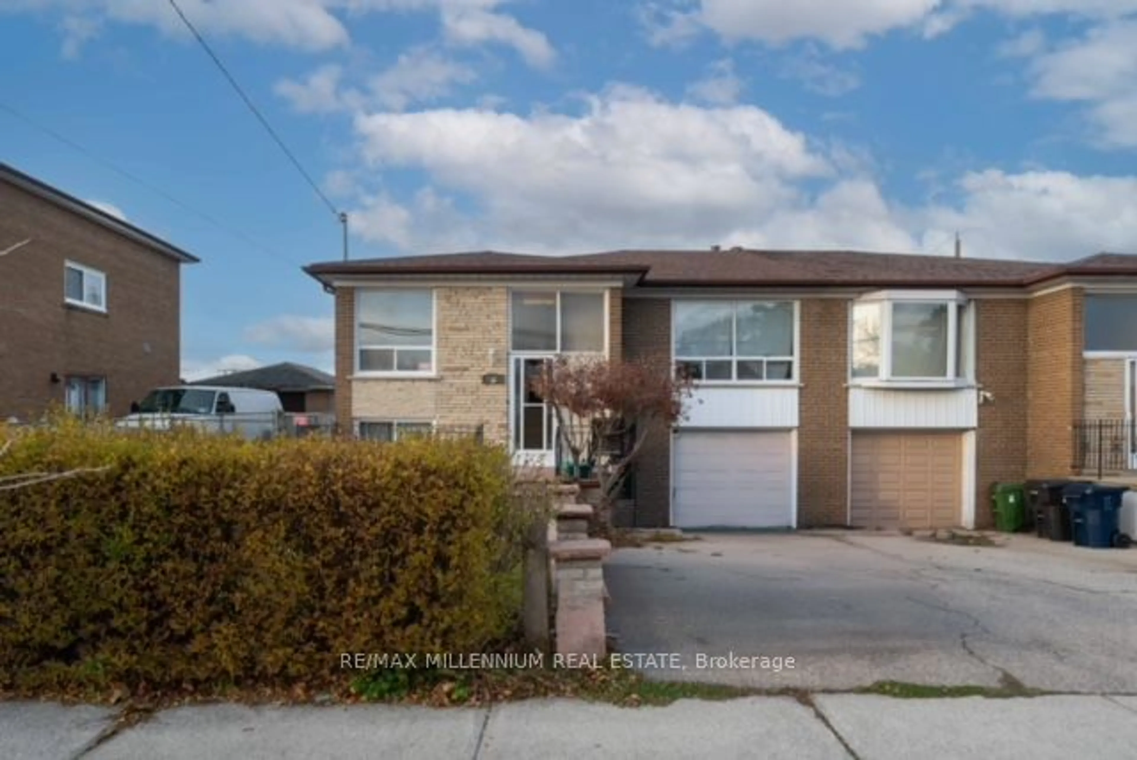 Frontside or backside of a home, the street view for 98 Spenvalley Dr, Toronto Ontario M3L 1Z3